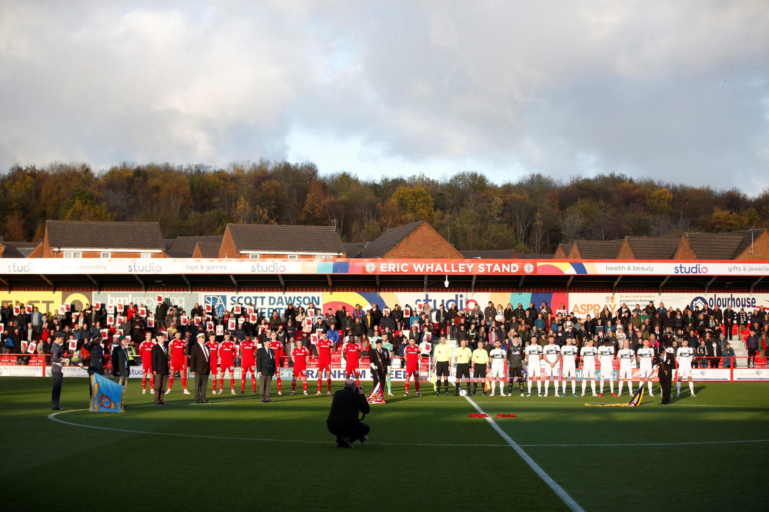 Soccer Football - League One - Accrington Stanley v Plymouth Argyle - Wham Stadium, Accrington, Britain - November 13, 2021 Players line up during a minutes silence as part of remembrance commemorations before the match Action Images/Ed Sykes