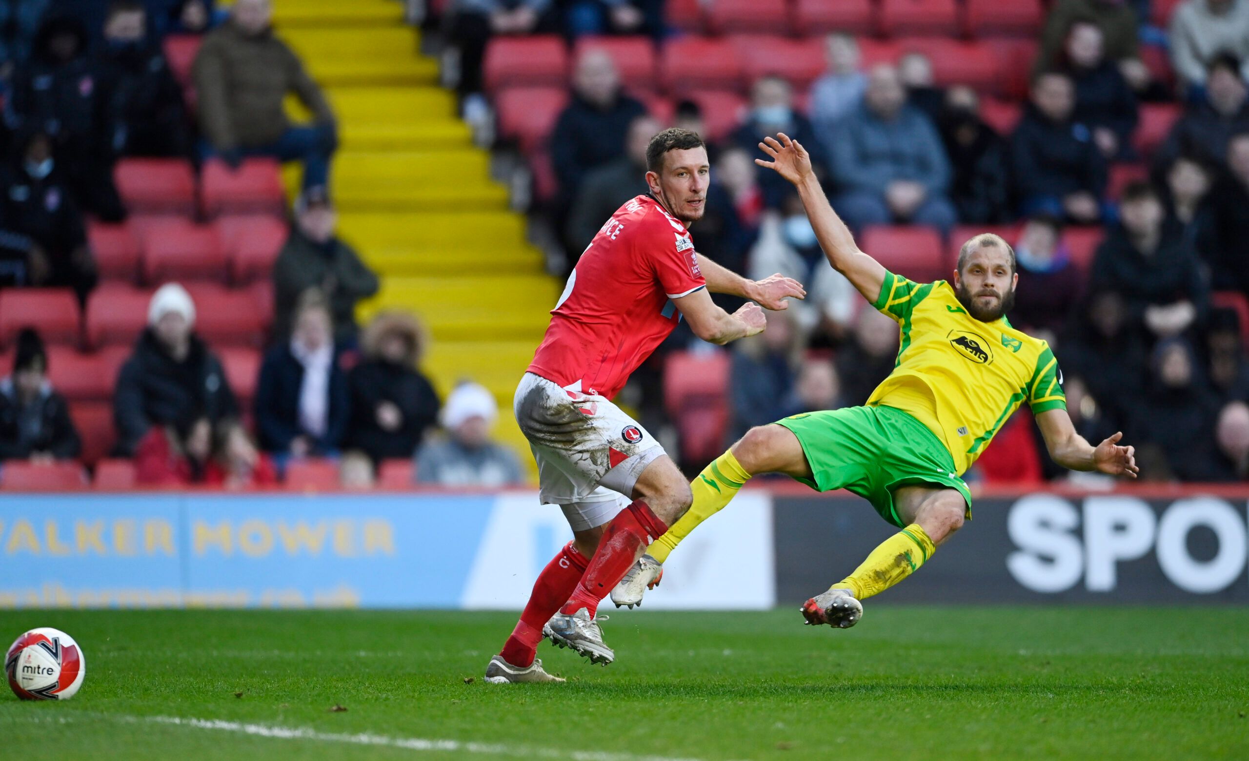 Soccer Football - FA Cup Third Round - Charlton Athletic v Norwich City - The Valley, London, Britain - January 9, 2022 Norwich City's Teemu Pukki in action with Charlton Athletic's Jason Pearce REUTERS/Tony Obrien