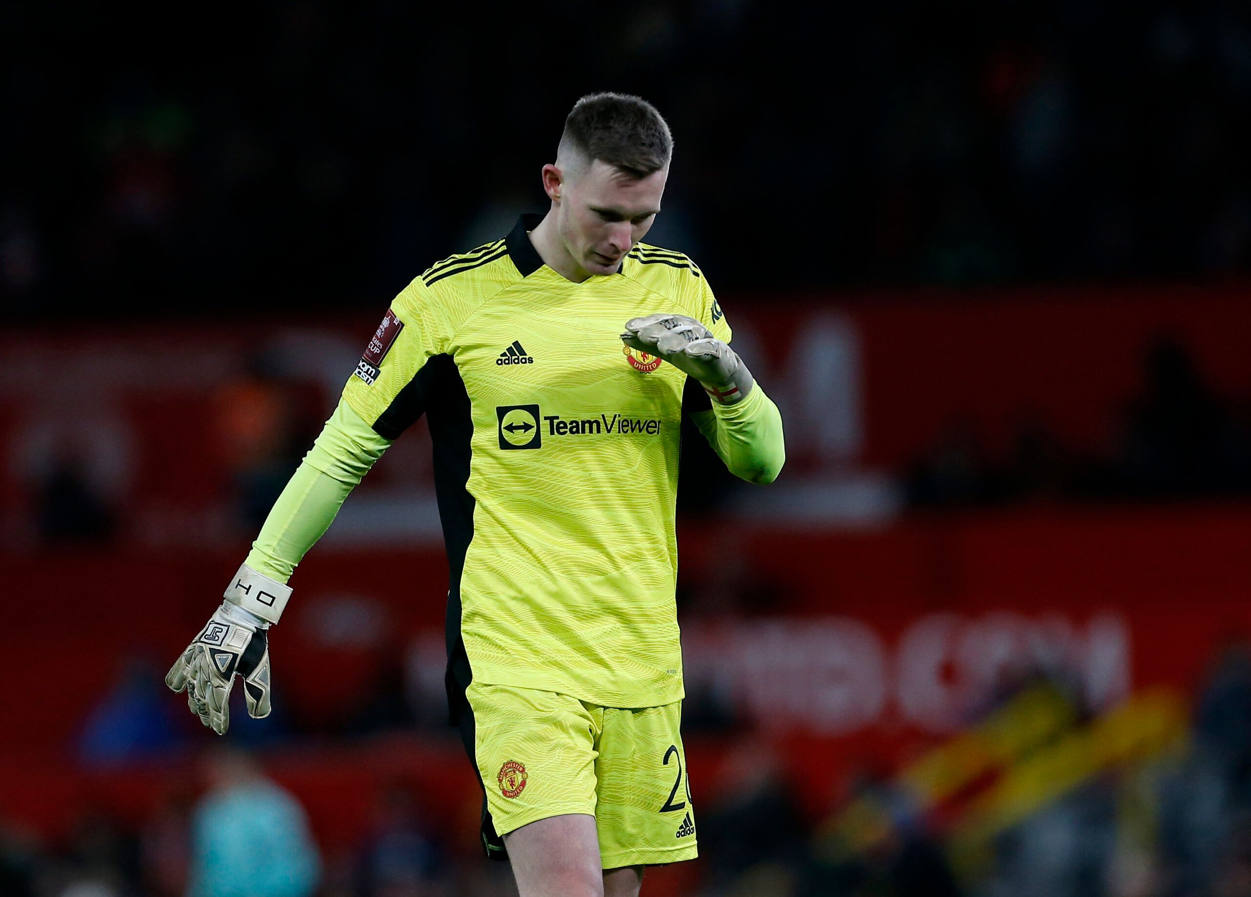 Soccer Football - FA Cup Fourth Round - Manchester United v Middlesbrough - Old Trafford, Manchester, Britain - February 4, 2022 Manchester United's Dean Henderson reacts REUTERS/Craig Brough