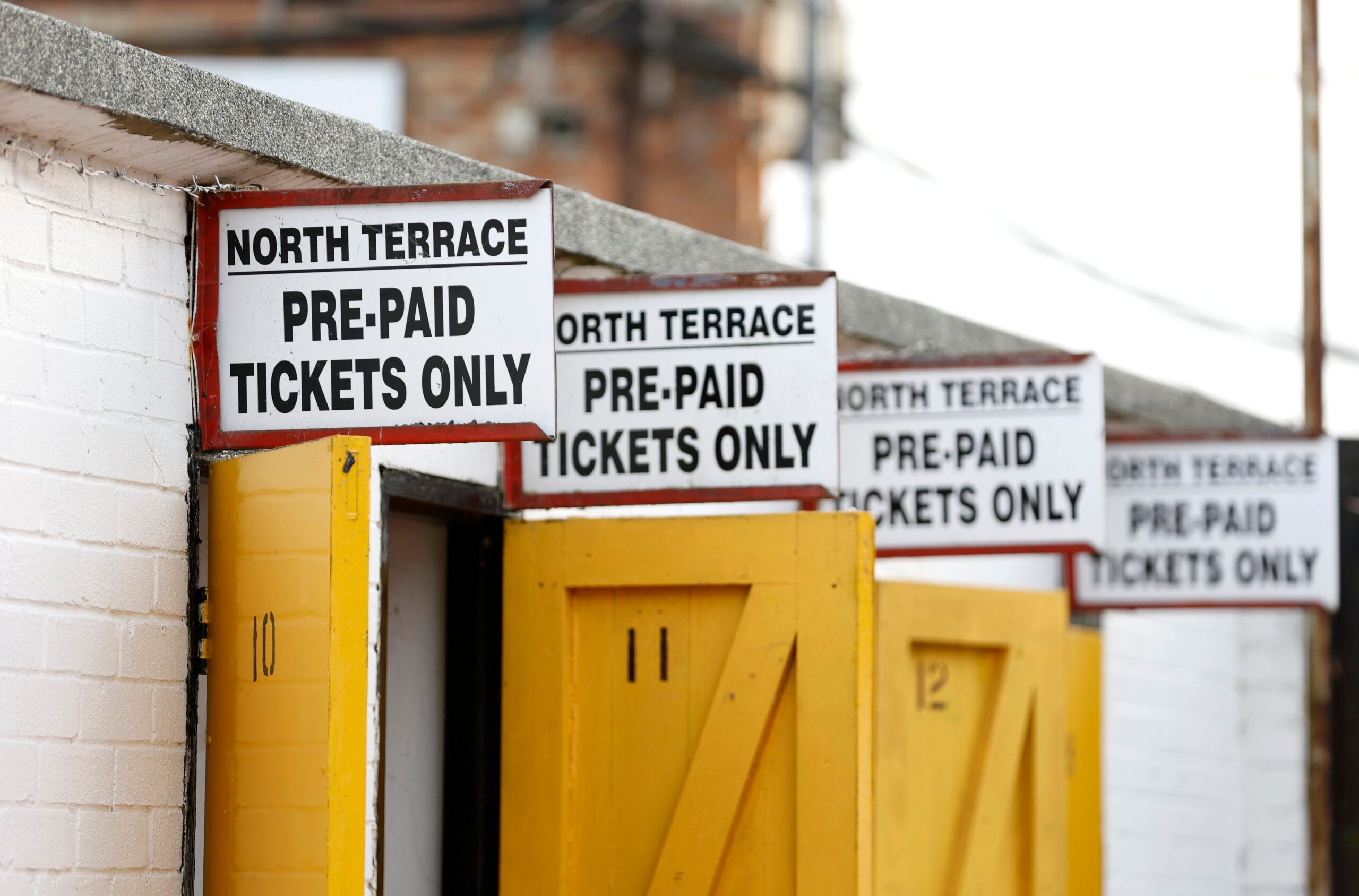 Soccer Football - FA Cup - Fourth Round - Cambridge United v Luton Town - Abbey Stadium, Cambridge, Britain - February 5, 2022  General view as the North Terrace entry sign is seen outside the stadium before the match Action Images/Peter Cziborra