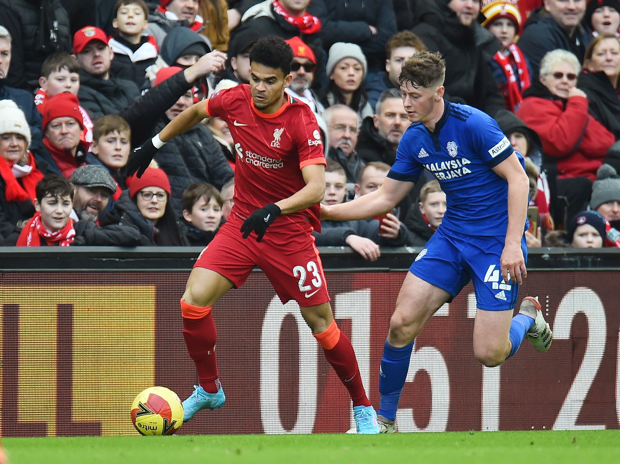 Soccer Football -  FA Cup - Fourth Round - Liverpool v Cardiff City - Anfield, Liverpool, Britain - February 6, 2022 Liverpool's Luis Diaz in action with Cardiff City's Oliver Denham REUTERS/Peter Powell