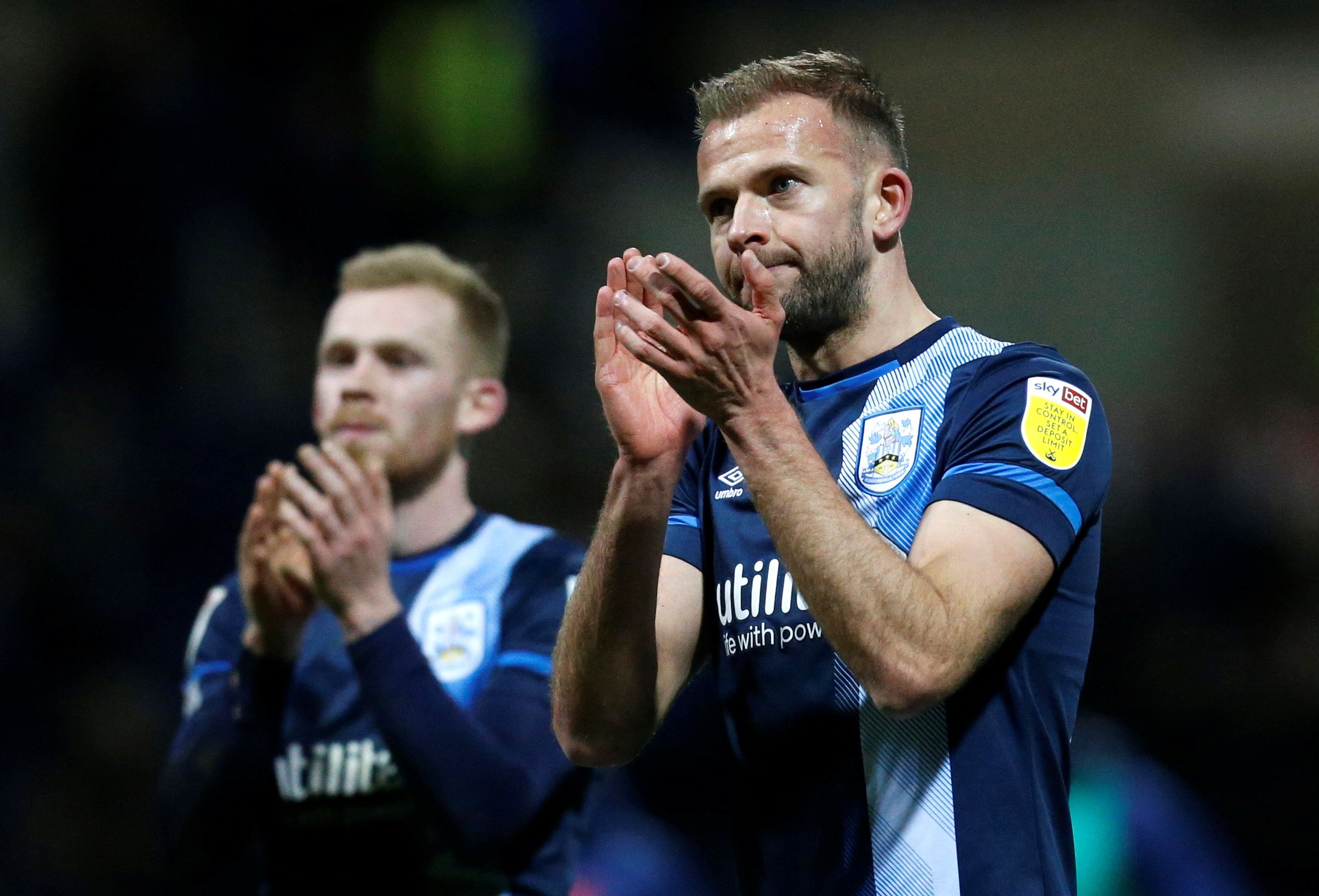 Soccer Football - Championship - Preston North End v Huddersfield Town - Deepdale, Preston, Britain - February 9, 2022  Huddersfield Town's Jordan Rhodes applauds the fans after the match  Action Images/Ed Sykes  EDITORIAL USE ONLY. No use with unauthorized audio, video, data, fixture lists, club/league logos or "live" services. Online in-match use limited to 75 images, no video emulation. No use in betting, games or single club/league/player publications.  Please contact your account representa