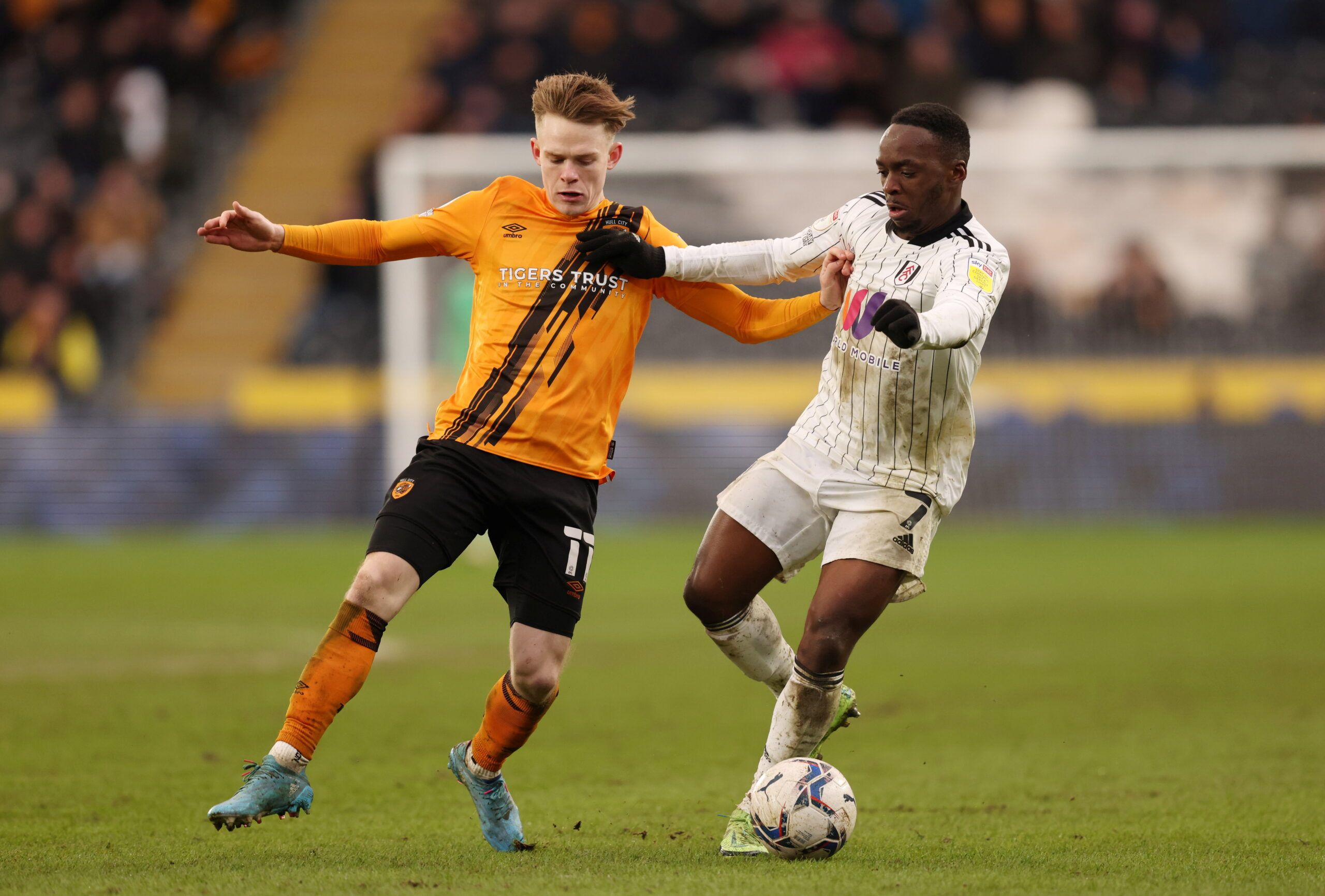 Soccer Football - Championship - Hull City v Fulham - KCOM Stadium, Hull, Britain - February 12, 2022 Fulham's Neeskens Kebano in action with Hull City's Keane Lewis-Potter  Action Images/John Clifton  EDITORIAL USE ONLY. No use with unauthorized audio, video, data, fixture lists, club/league logos or 