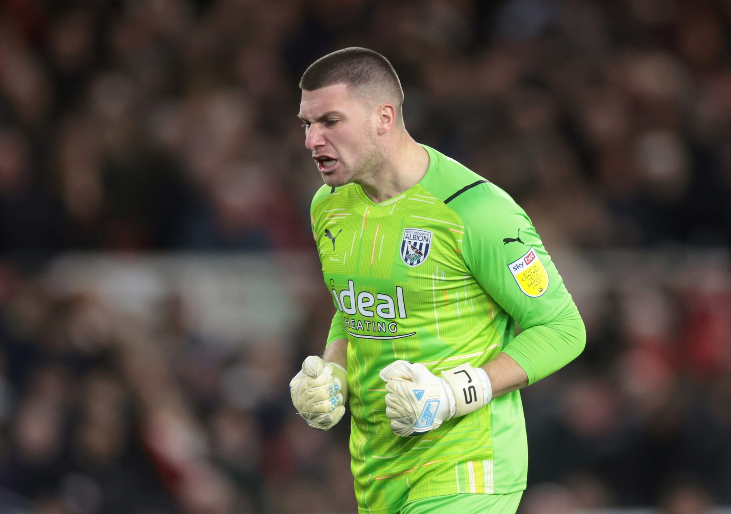 Soccer Football - Championship - Middlesbrough v West Bromwich Albion - Riverside Stadium, Middlesbrough, Britain - February 22, 2022  West Bromwich Albion's Sam Johnstone celebrates their first goal scored by Jayson Molumby Action Images/Lee Smith