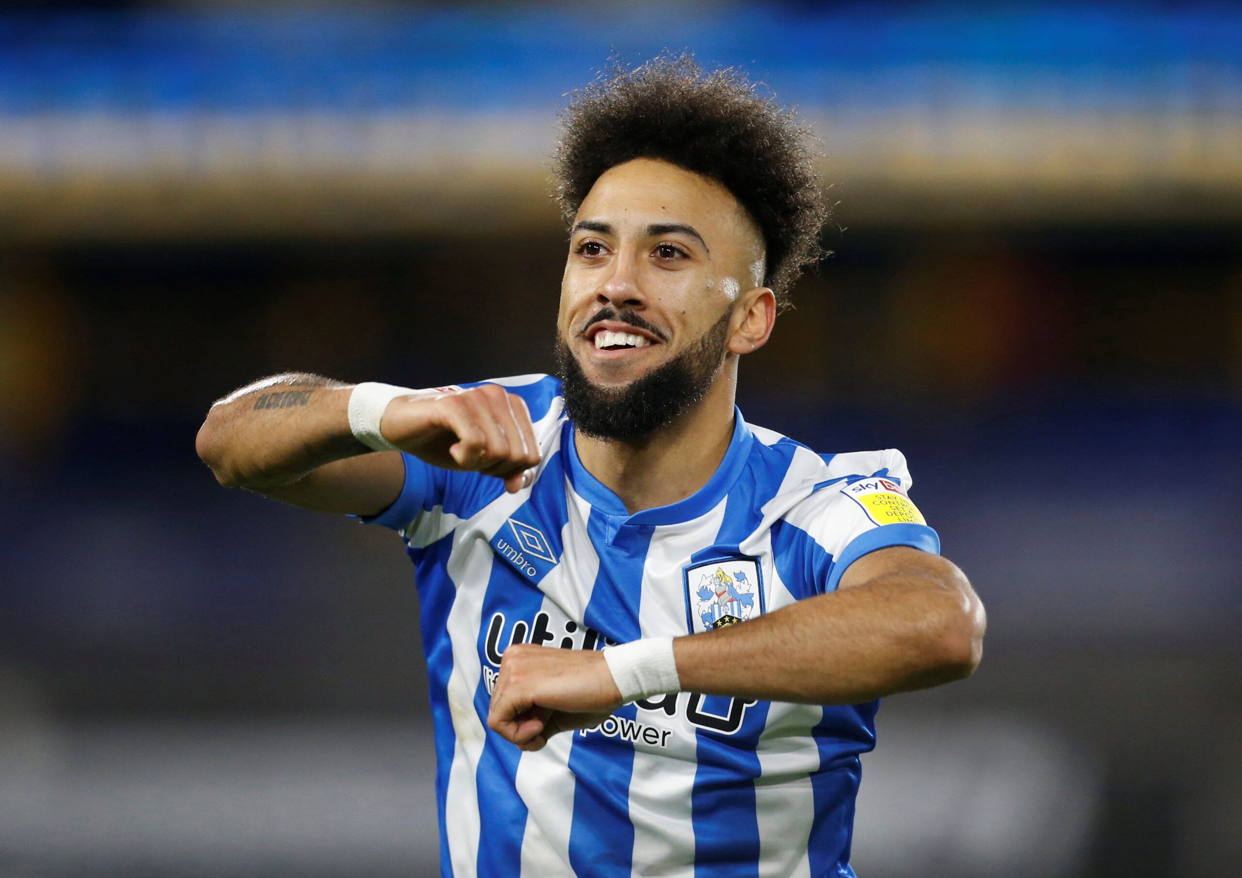 Soccer Football - Championship - Huddersfield Town v Peterborough United - John Smith's Stadium, Huddersfield, Britain - March 4, 2022 Huddersfield Town's Sorba Thomas celebrates after the match Action Images/Ed Sykes  EDITORIAL USE ONLY. No use with unauthorized audio, video, data, fixture lists, club/league logos or 