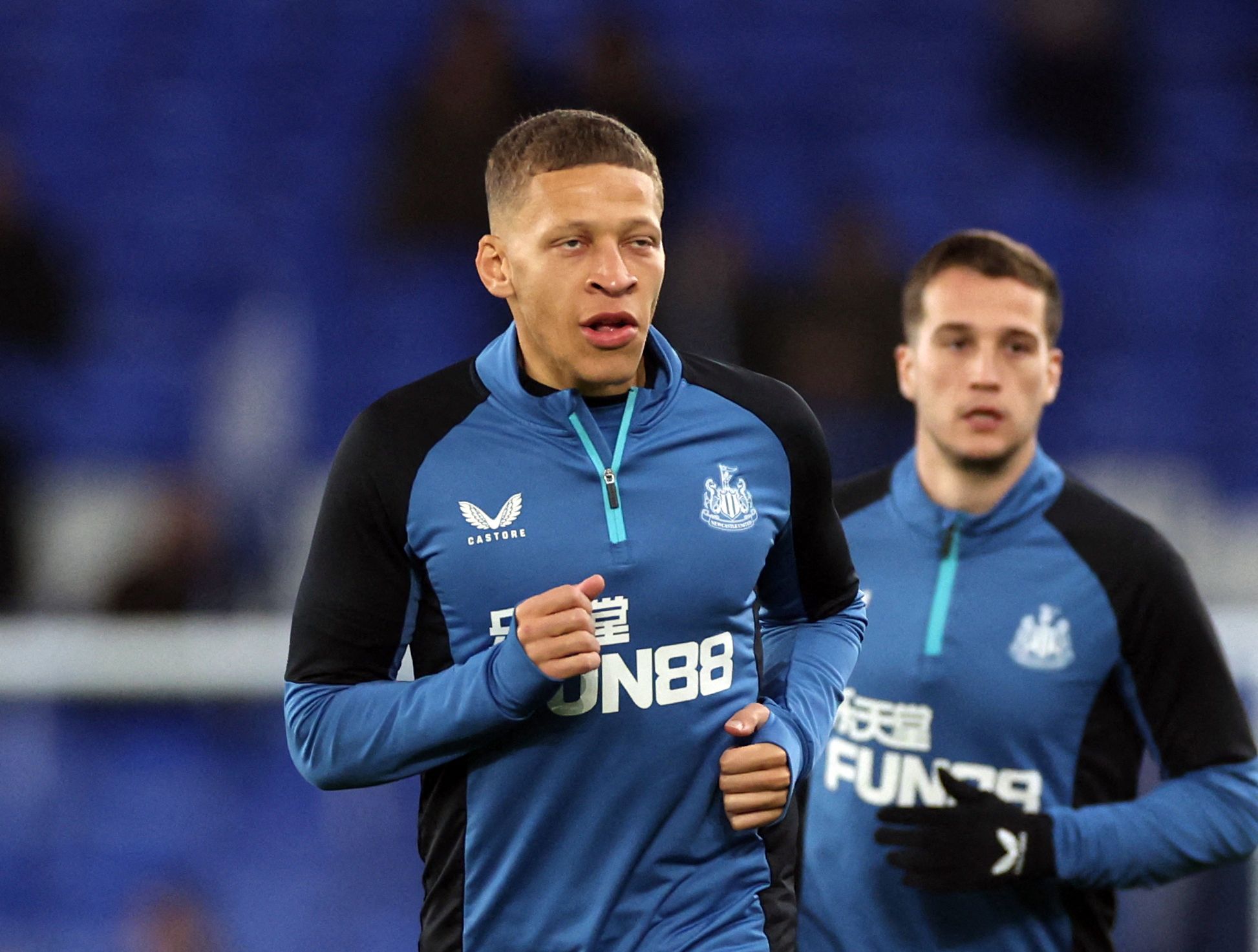 Soccer Football - Premier League - Everton v Newcastle United - Goodison Park, Liverpool, Britain - March 17, 2022 Newcastle United's Dwight Gayle during the warm up before the match REUTERS/Phil Noble EDITORIAL USE ONLY. No use with unauthorized audio, video, data, fixture lists, club/league logos or 'live' services. Online in-match use limited to 75 images, no video emulation. No use in betting, games or single club /league/player publications.  Please contact your account representative for f