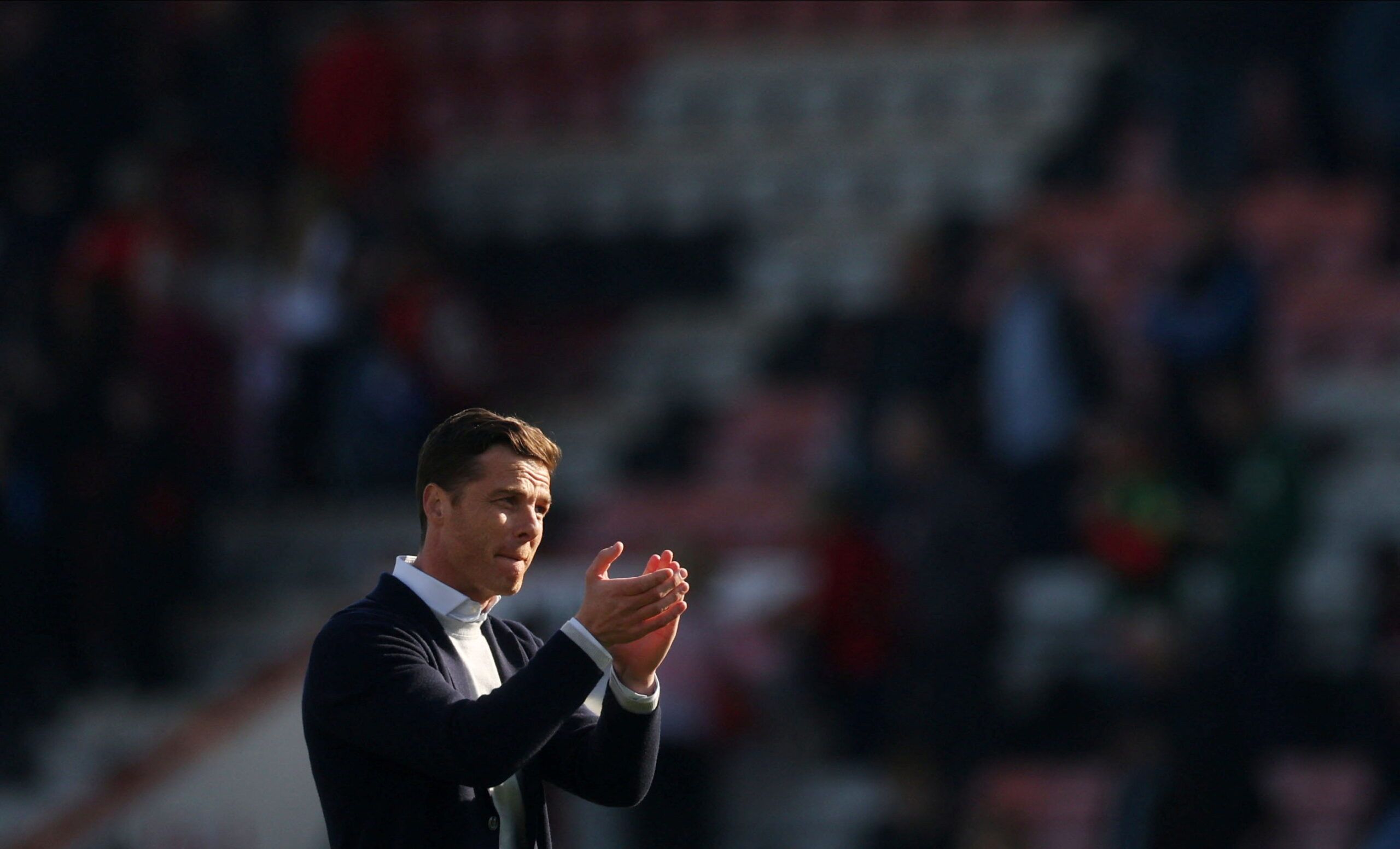 Soccer Football - Championship - AFC Bournemouth v Middlesbrough - Vitality Stadium, Bournemouth, Britain - April 15, 2022 AFC Bournemouth manager Scott Parker applauds fans after the match  Action Images/Paul Childs  EDITORIAL USE ONLY. No use with unauthorized audio, video, data, fixture lists, club/league logos or 