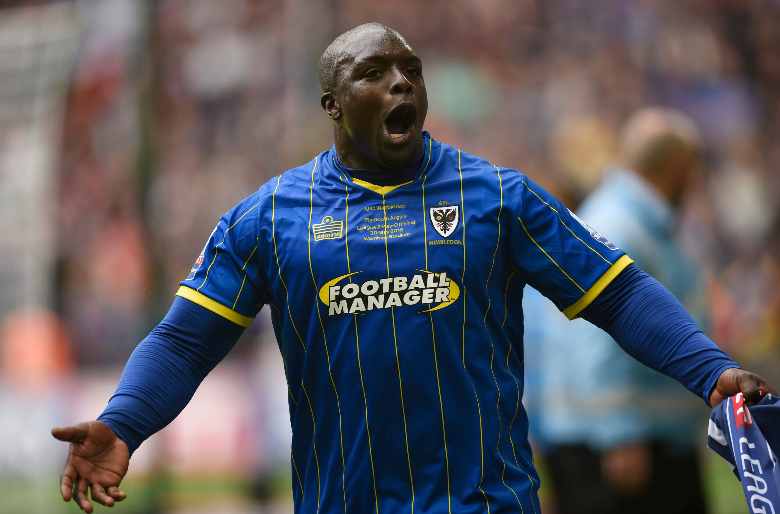 Britain Soccer Football - AFC Wimbledon v Plymouth Argyle - Sky Bet Football League Two Play-Off Final - Wembley Stadium - 30/5/16 
AFC Wimbledon's Adebayo Akinfenwa celebrates at the end of the match 
Mandatory Credit: Action Images / Tony O'Brien 
Livepic 
EDITORIAL USE ONLY. No use with unauthorized audio, video, data, fixture lists, club/league logos or 