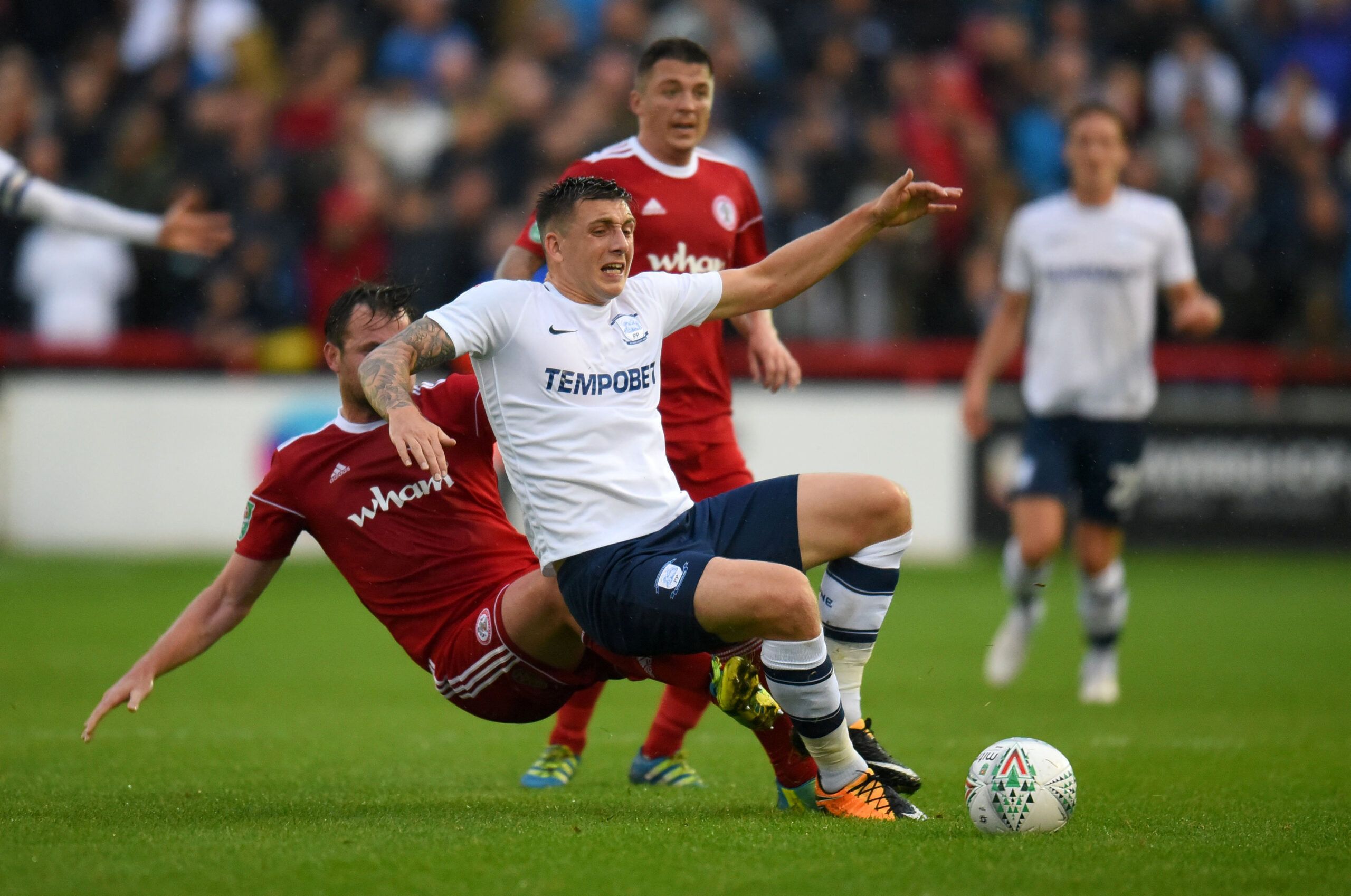 Soccer Football - Carabao Cup First Round - Accrington Stanley vs Preston North End - Accrington, Britain - August 8, 2017  Accrington Stanley's Mark Hughes in action with Preston North End's Jordan Hugill   Action Images/Paul Burrows
