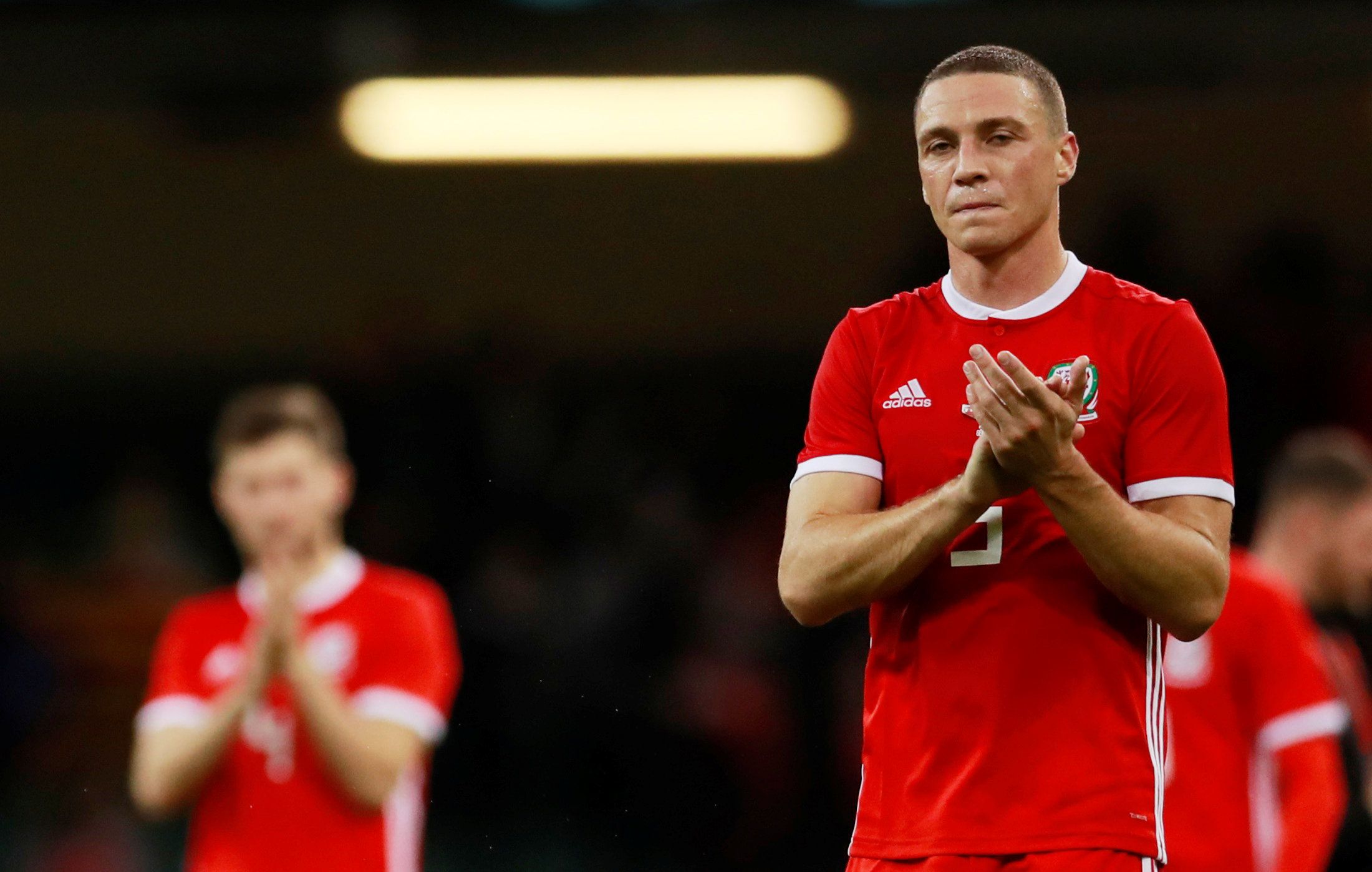Soccer Football - International Friendly - Wales v Spain - Principality Stadium, Cardiff, Britain - October 11, 2018  Wales' James Chester applauds their fans after the match   Action Images via Reuters/Andrew Couldridge