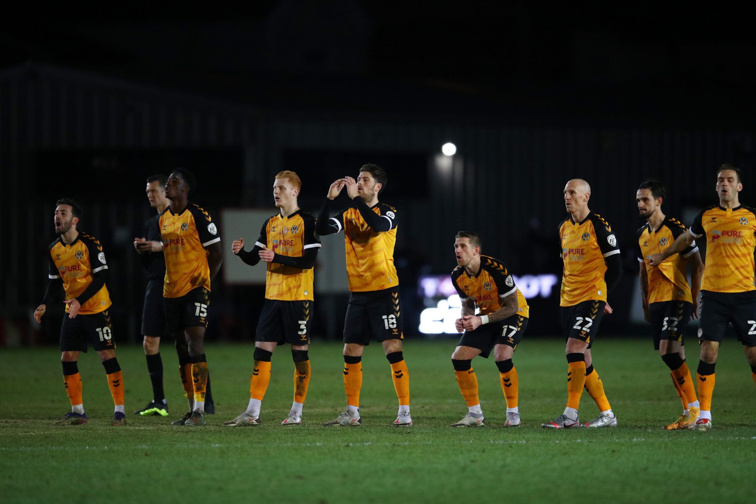 Soccer Football - FA Cup - Third Round - Newport County AFC v Brighton &amp; Hove Albion - Rodney Parade, Newport, Britain - January 10, 2021 Newport County players react in the penalty shootout REUTERS/Michael Steele
