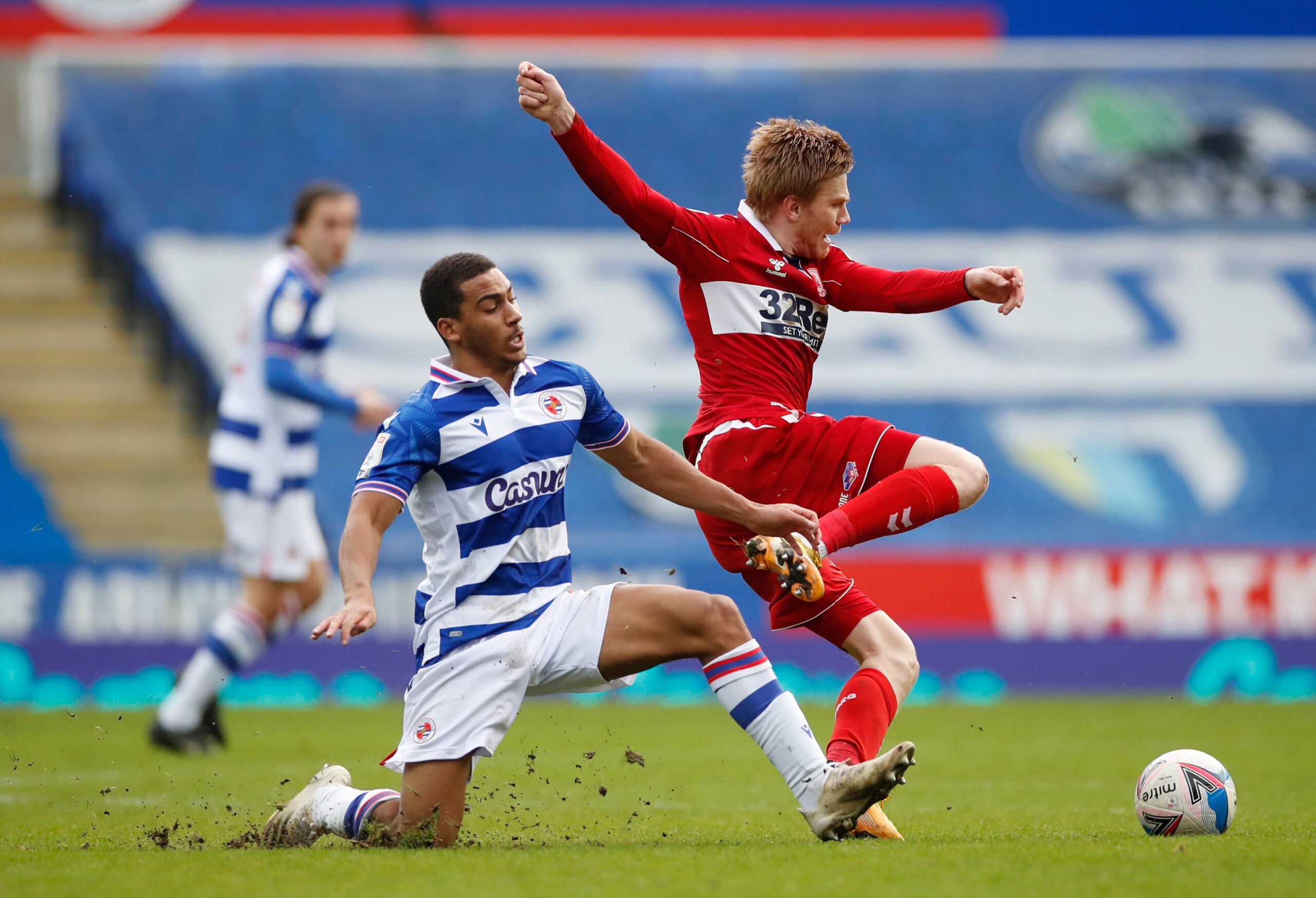 Soccer Football - Championship - Reading v Middlesbrough - Madejski Stadium, Reading, Britain - February 20, 2021 Reading's Andy Rinomhota in action with Middlesbrough's Duncan Watmore Action Images/Paul Childs EDITORIAL USE ONLY. No use with unauthorized audio, video, data, fixture lists, club/league logos or 'live' services. Online in-match use limited to 75 images, no video emulation. No use in betting, games or single club /league/player publications.  Please contact your account representat