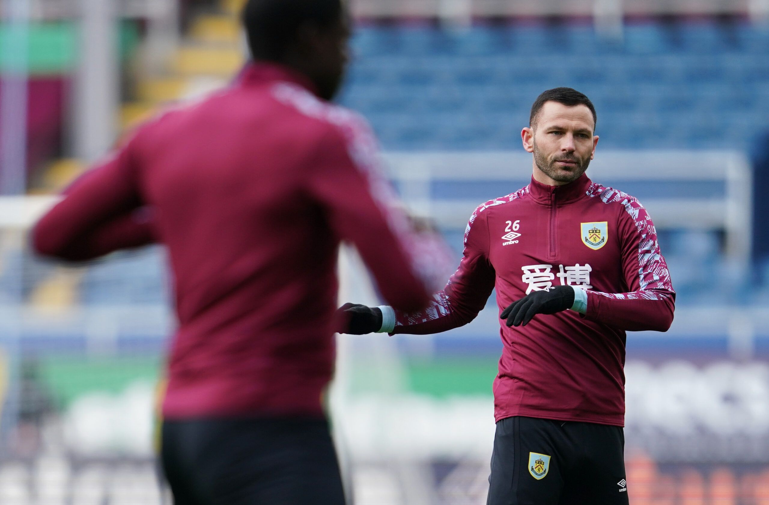Soccer Football - Premier League - Burnley v Newcastle United - Turf Moor, Burnley, Britain - April 11, 2021 Burnley's Phil Bardsley during the warm up before the match Pool via REUTERS/Jon Super EDITORIAL USE ONLY. No use with unauthorized audio, video, data, fixture lists, club/league logos or 'live' services. Online in-match use limited to 75 images, no video emulation. No use in betting, games or single club /league/player publications.  Please contact your account representative for further