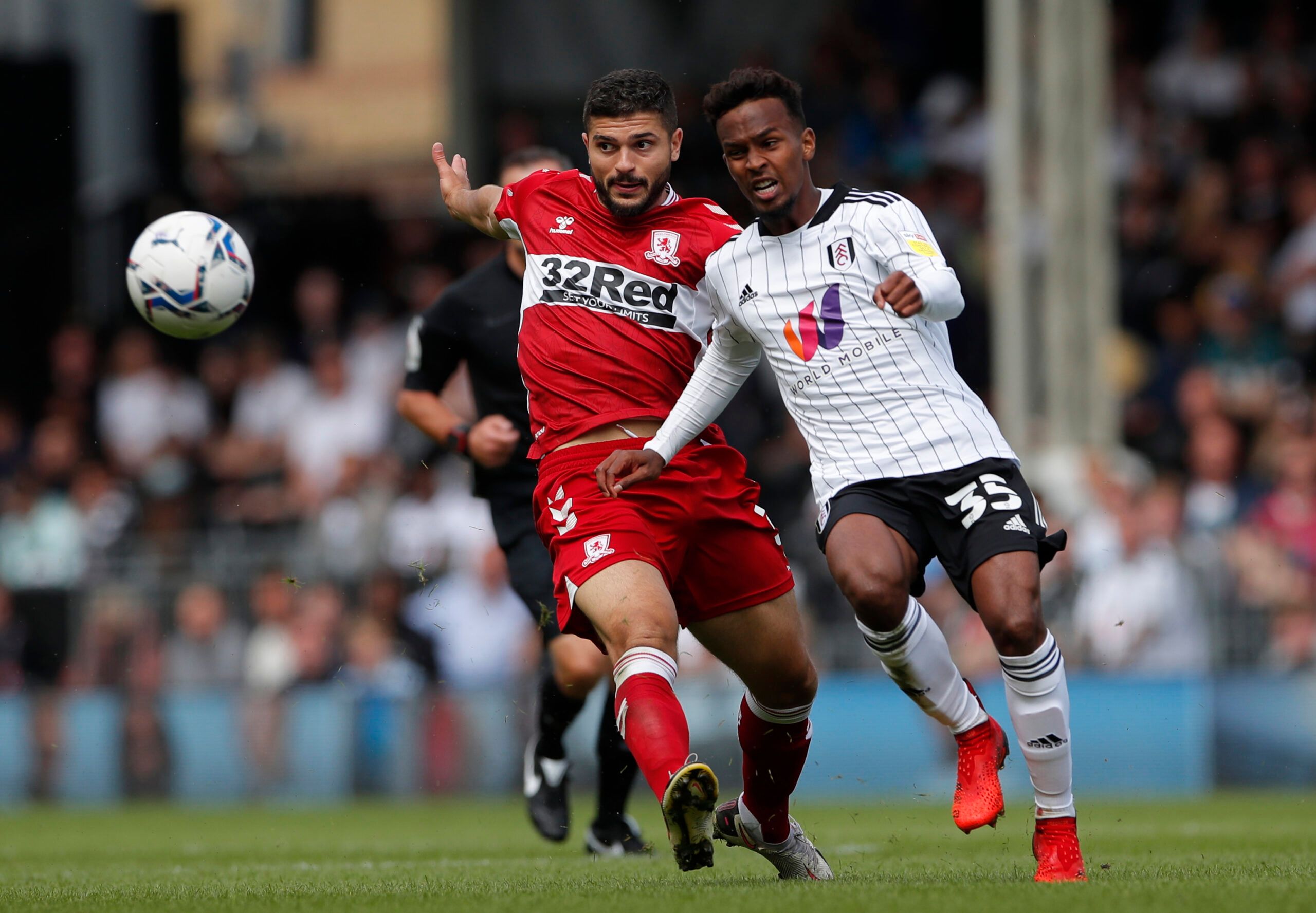 Soccer Football - Championship - Fulham v Middlesbrough - Craven Cottage, London, Britain - August 8, 2021 Middlesbrough's Sam Morsy in action with Fulham’s Tyrese Francois Action Images/Andrew Couldridge