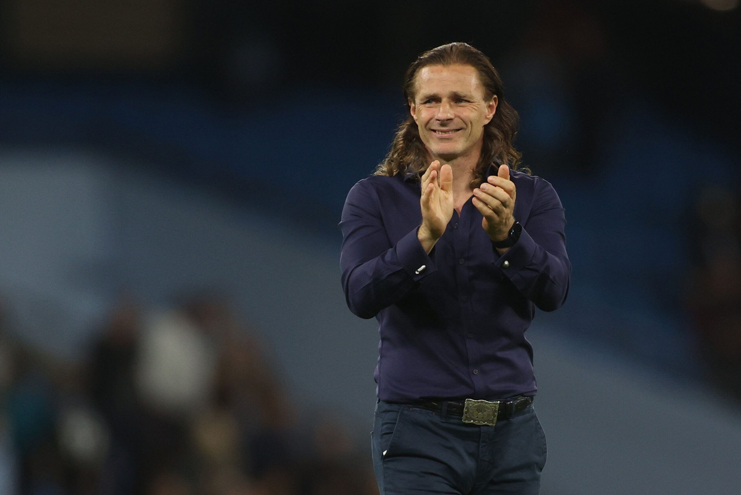 Soccer Football - Carabao Cup - Third Round - Manchester City v Wycombe Wanderers - Etihad Stadium, Manchester, Britain - September 21, 2021 Wycombe Wanderers manager Gareth Ainsworth applauds fans after the match Action Images via Reuters/Carl Recine EDITORIAL USE ONLY. No use with unauthorized audio, video, data, fixture lists, club/league logos or 'live' services. Online in-match use limited to 75 images, no video emulation. No use in betting, games or single club /league/player publications.