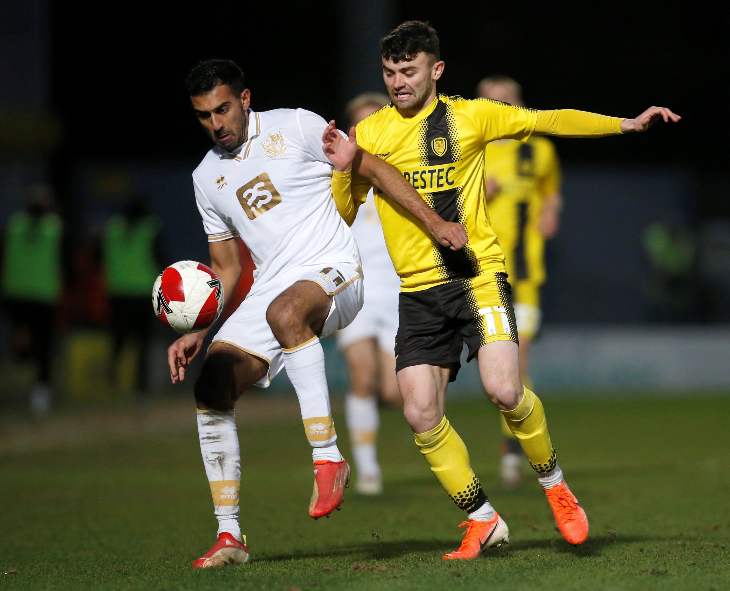 Soccer Football - FA Cup Second Round - Burton Albion v Port Vale - Pirelli Stadium, Burton-on-Trent, Britain - December 4, 2021 Port Vale's Mal Benning in action with Burton Albion's Jonny Smith   Action Images/Ed Sykes