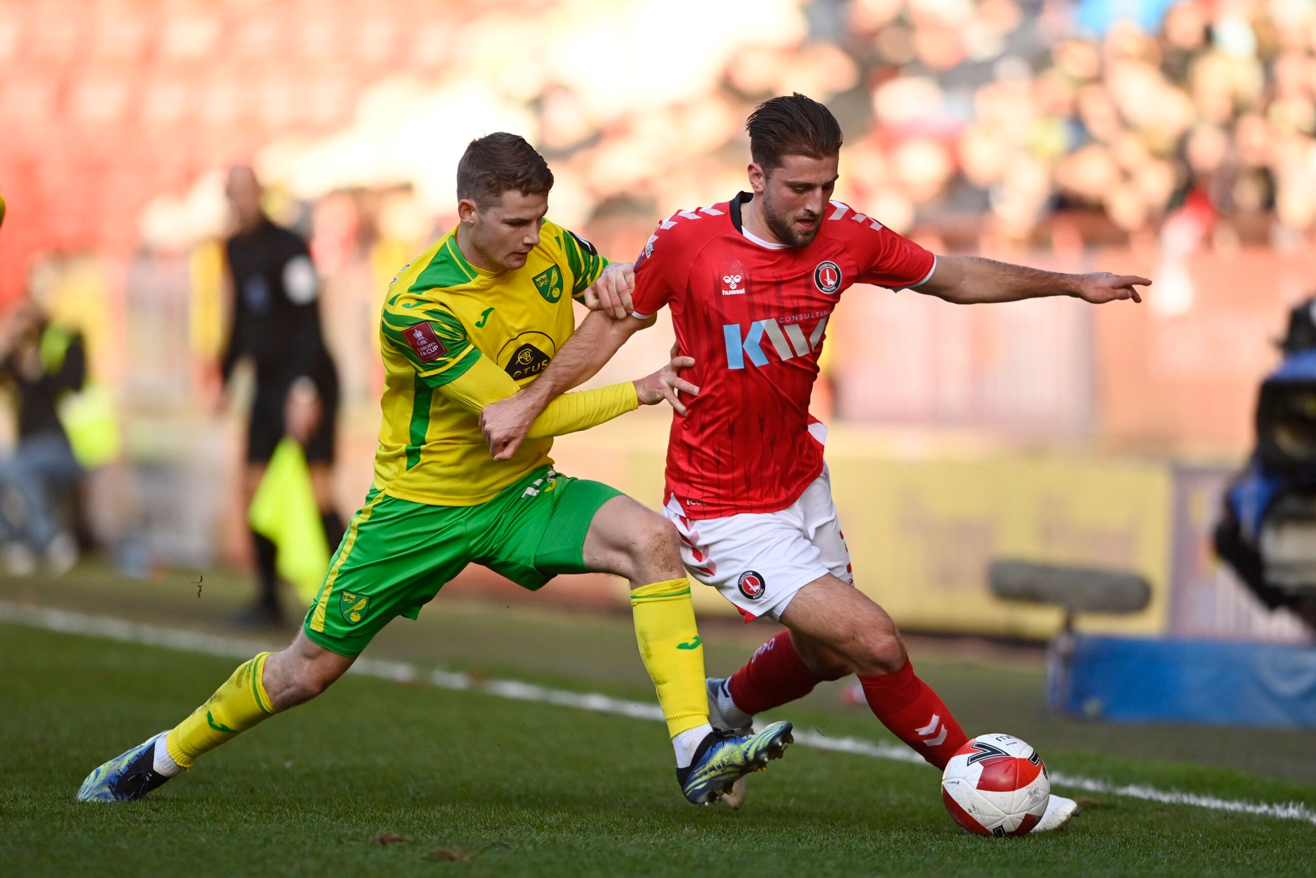 Soccer Football - FA Cup Third Round - Charlton Athletic v Norwich City - The Valley, London, Britain - January 9, 2022 Charlton Athletic's Ben Purrington in action with Norwich City's Jacob Sorensen REUTERS/Tony Obrien