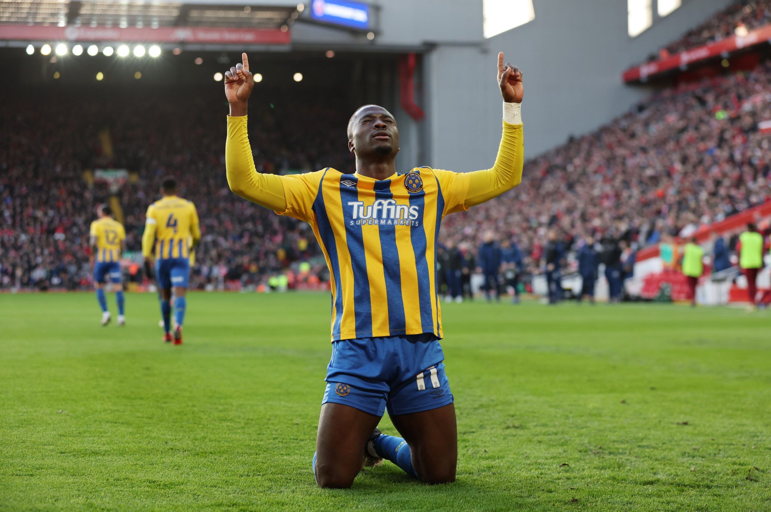 Soccer Football - FA Cup Third Round - Liverpool v Shrewsbury Town - Anfield, Liverpool, Britain - January 9, 2022 Shrewsbury Town's Daniel Udoh celebrates scoring their first goal REUTERS/Phil Noble