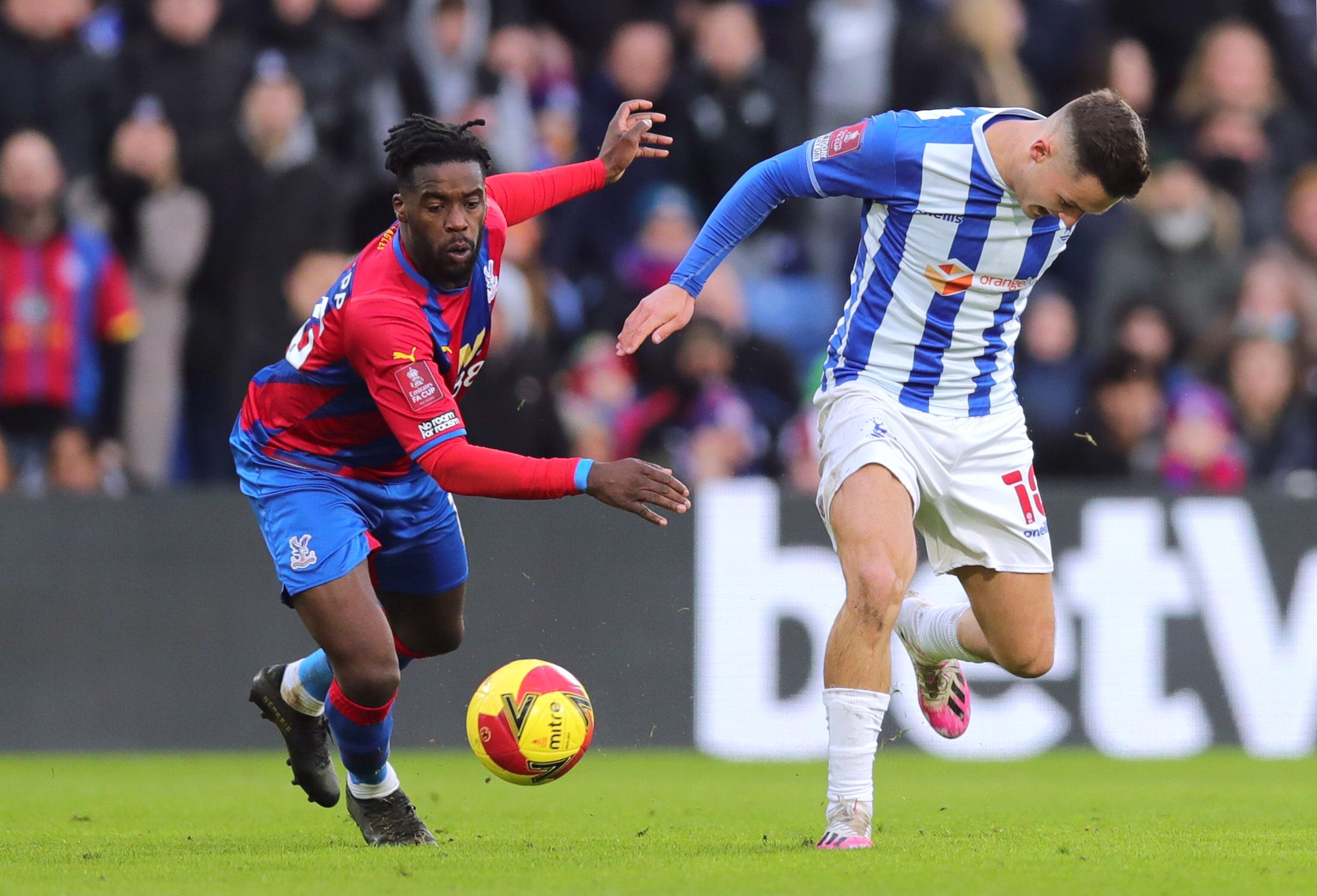 Soccer Football - FA Cup - Fourth Round - Crystal Palace v Hartlepool United - Selhurst Park, London, Britain - February 5, 2022 Hartlepool United's Luke Molyneux in action with Crystal Palace's Jeffrey Schlupp REUTERS/Chris Radburn
