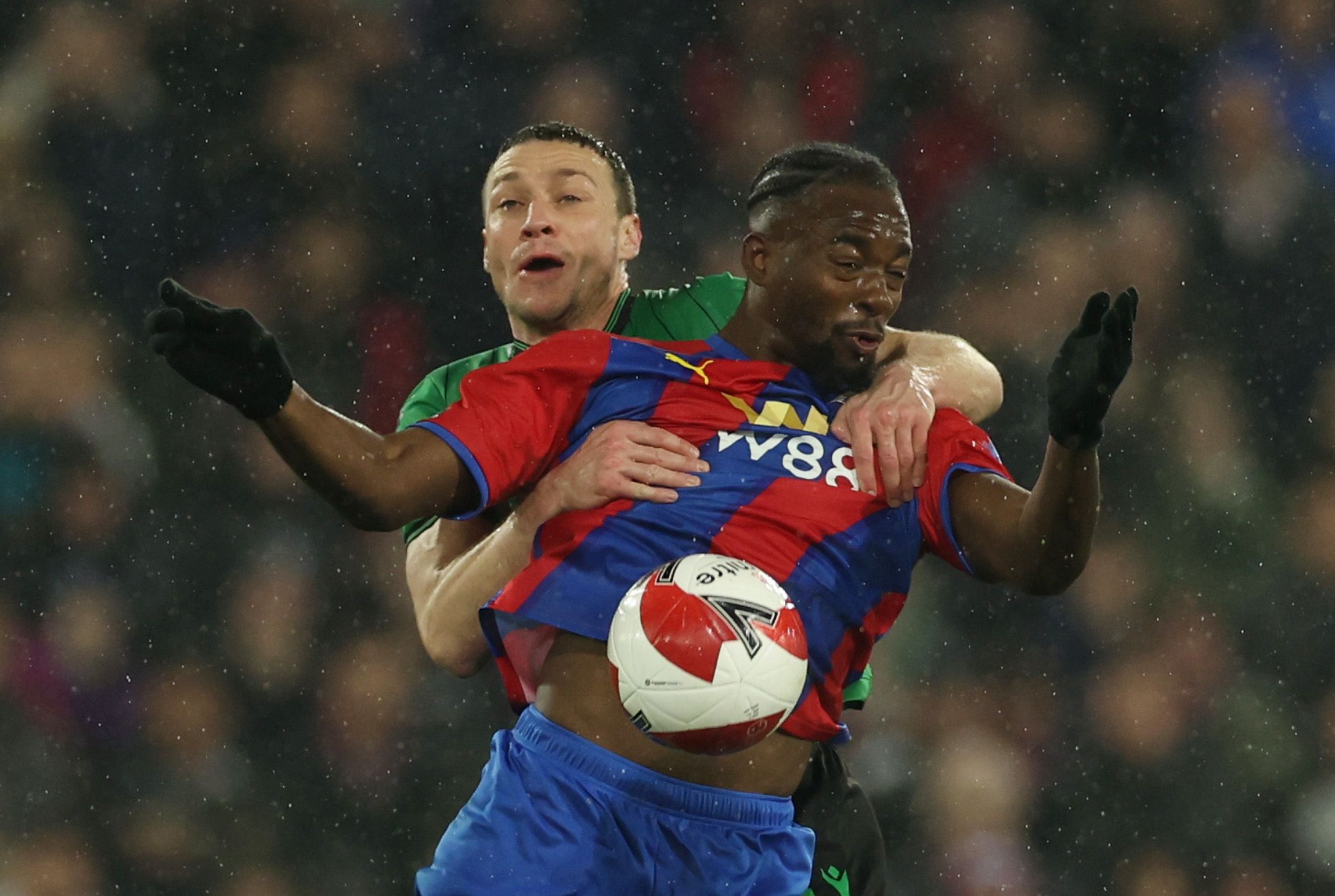 Soccer Football - FA Cup Fifth Round - Crystal Palace v Stoke City - Selhurst Park, London, Britain - March 1, 2022 Crystal Palace's Jean-Philippe Mateta in action with Stoke City's James Chester Action Images via Reuters/Paul Childs