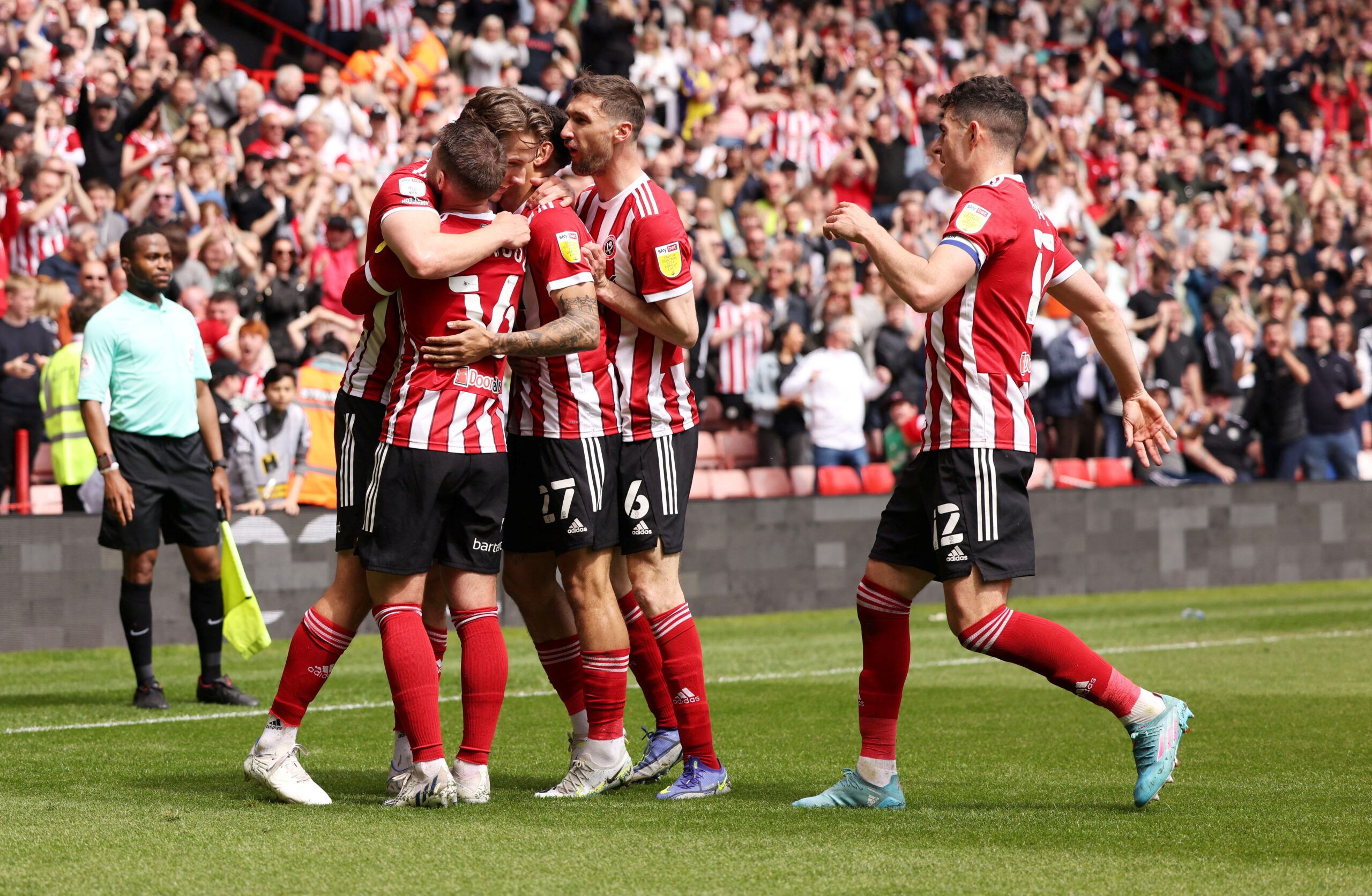 Soccer Football - Championship - Sheffield United v Fulham - Bramall Lane, Sheffield, Britain - May 7, 2022 Sheffield United's Sander Berge celebrates scoring their third goal with teammates        Action Images/John Clifton  EDITORIAL USE ONLY. No use with unauthorized audio, video, data, fixture lists, club/league logos or 