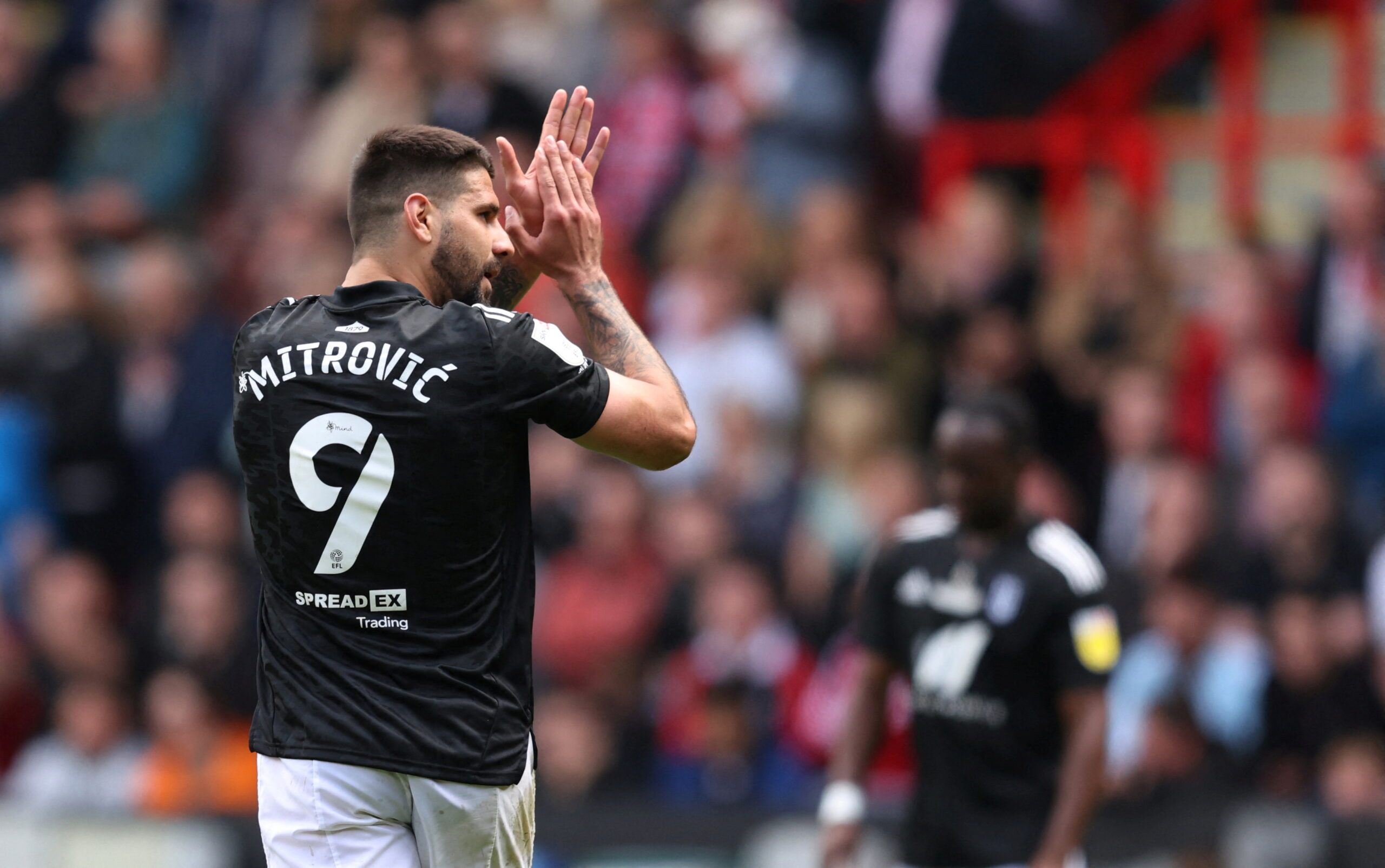 Soccer Football - Championship - Sheffield United v Fulham - Bramall Lane, Sheffield, Britain - May 7, 2022 Fulham's Aleksandar Mitrovic applauds fans after being substituted      Action Images/John Clifton  EDITORIAL USE ONLY. No use with unauthorized audio, video, data, fixture lists, club/league logos or 