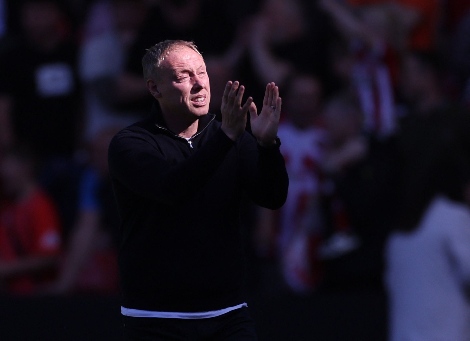 Soccer Football - Championship - Semi Final - First Leg - Sheffield United v Nottingham Forest - Bramall Lane, Sheffield, Britain - May 14, 2022 Nottingham Forest manager Steve Cooper applauds fans after the match Action Images via Reuters/Carl Recine EDITORIAL USE ONLY. No use with unauthorized audio, video, data, fixture lists, club/league logos or 'live' services. Online in-match use limited to 75 images, no video emulation. No use in betting, games or single club /league/player publications.