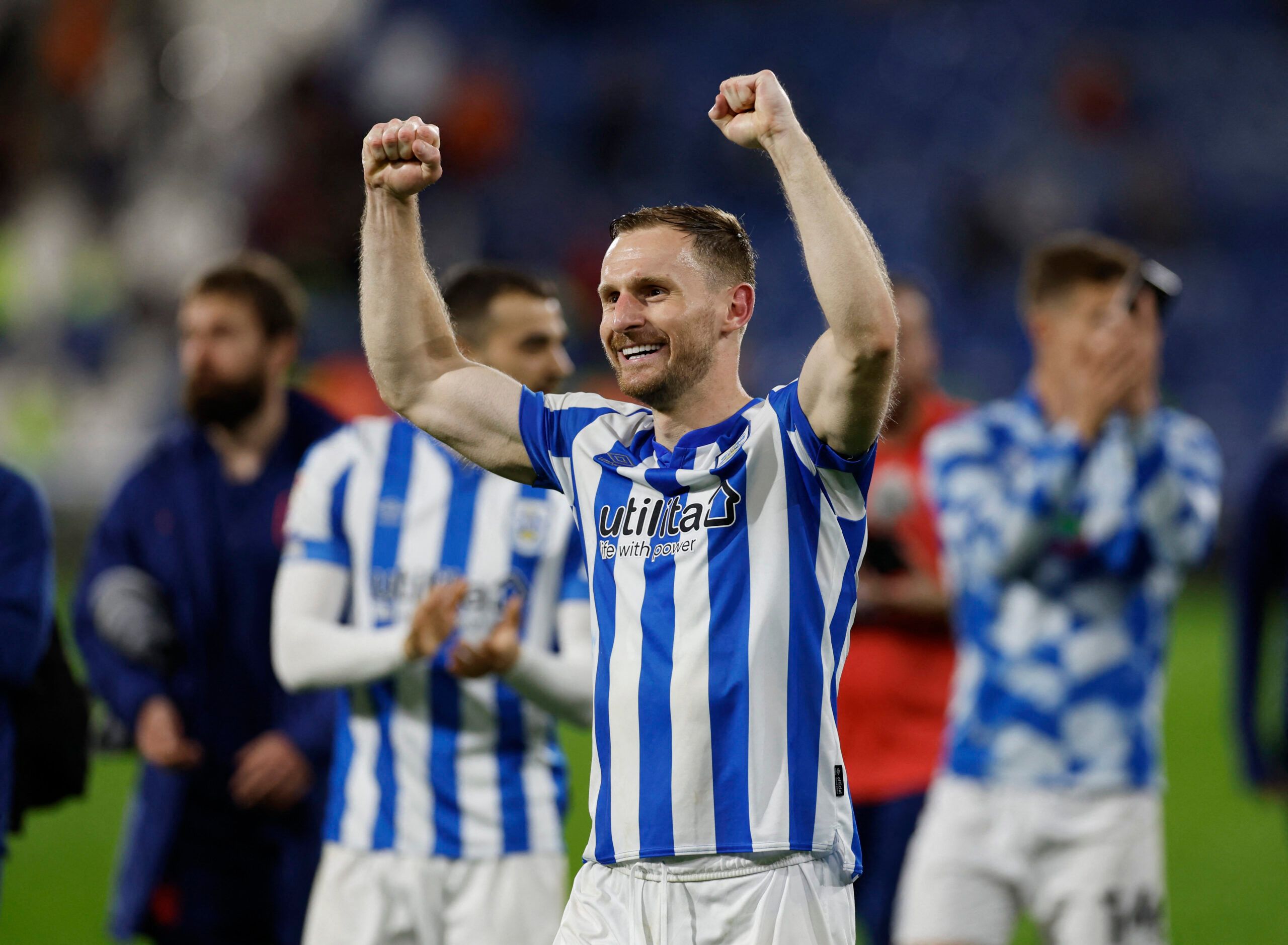 Soccer Football - Championship - Play-Offs Second Leg - Huddersfield Town v Luton Town - John Smith's Stadium, Huddersfield, Britain - May 16, 2022 Huddersfield Town's Tom Lees celebrates after reaching the Championship Play-Off Final Action Images via Reuters/Jason Cairnduff