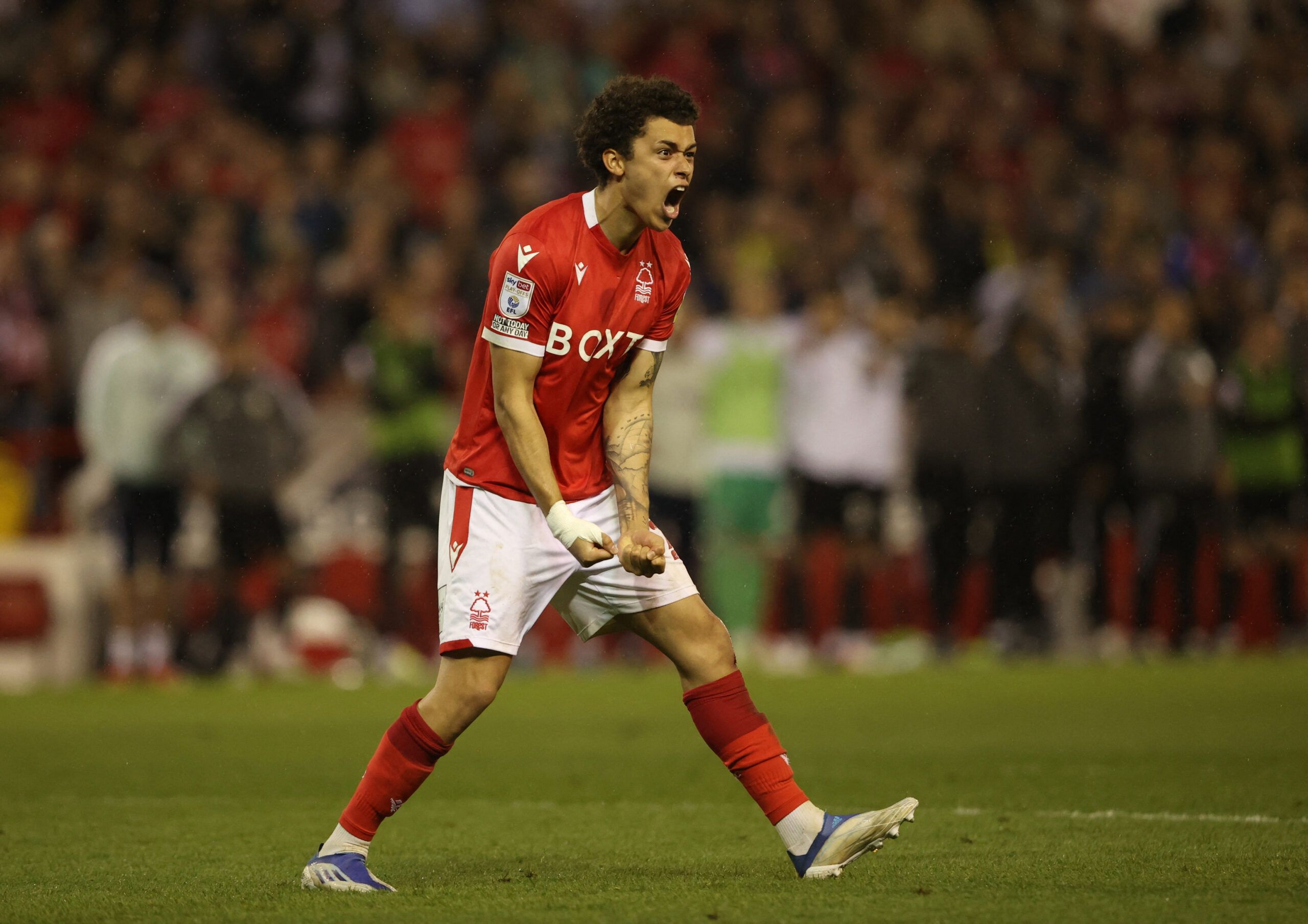 Soccer Football - Championship - Play-Offs Second Leg - Nottingham Forest v Sheffield United - The City Ground, Nottingham, Britain - May 17, 2022 Nottingham Forest's Brennan Johnson celebrates after scoring his penalty during the shoot-out Action Images via Reuters/Molly Darlington