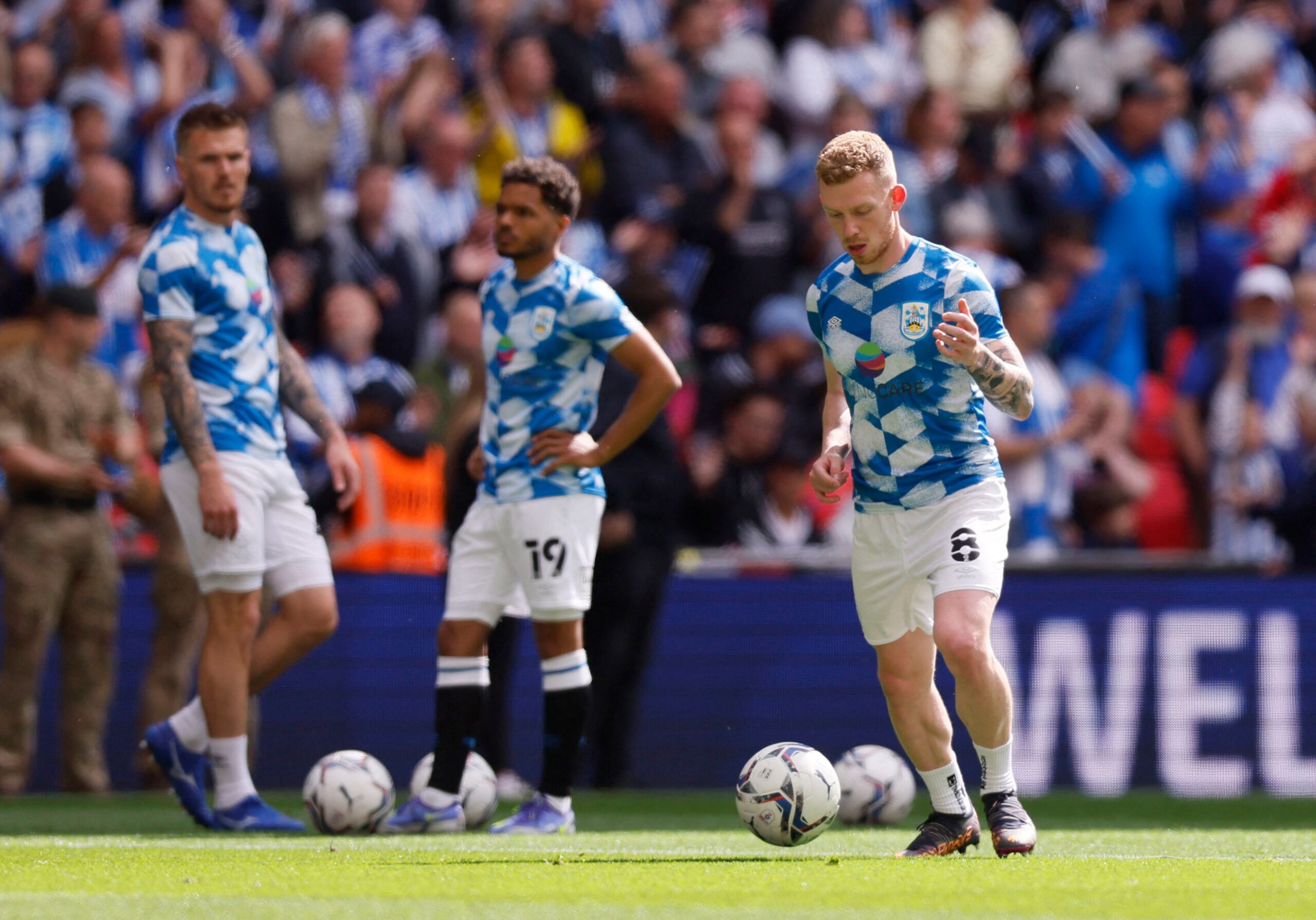 Soccer Football - Championship Play-Off Final - Huddersfield Town v Nottingham Forest - Wembley Stadium, London, Britain - May 29, 2022 Huddersfield Town's Lewis O'Brien during the warm up before the match Action Images via Reuters/Andrew Couldridge
