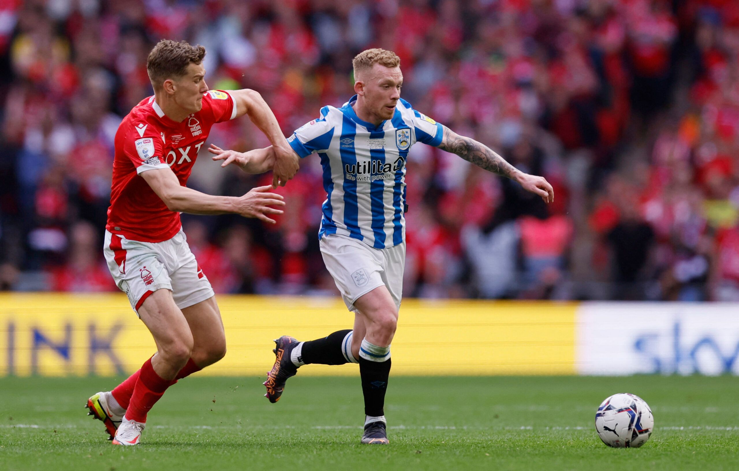Soccer Football - Championship Play-Off Final - Huddersfield Town v Nottingham Forest - Wembley Stadium, London, Britain - May 29, 2022 Nottingham Forest's Ryan Yates in action with Huddersfield Town's Lewis O'Brien Action Images via Reuters/Andrew Couldridge