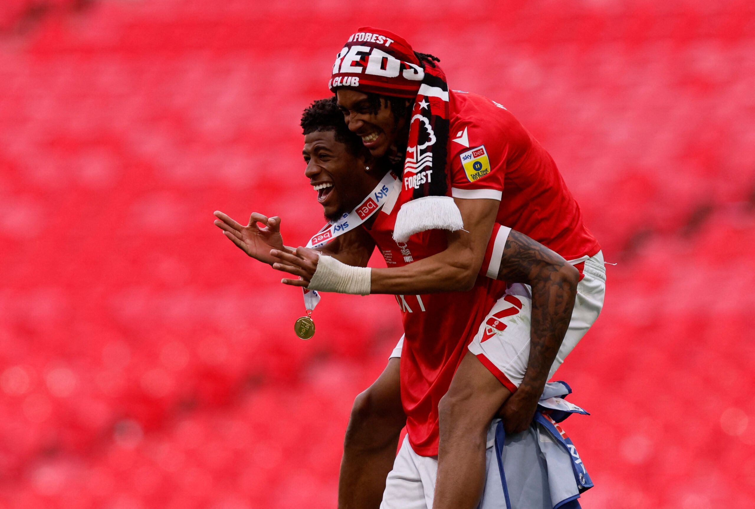 Soccer Football - Championship Play-Off Final - Huddersfield Town v Nottingham Forest - Wembley Stadium, London, Britain - May 29, 2022 Nottingham Forest's Jonathan Panzo and Djed Spence celebrate after winning the Championship Play-Off Final Action Images via Reuters/Andrew Couldridge