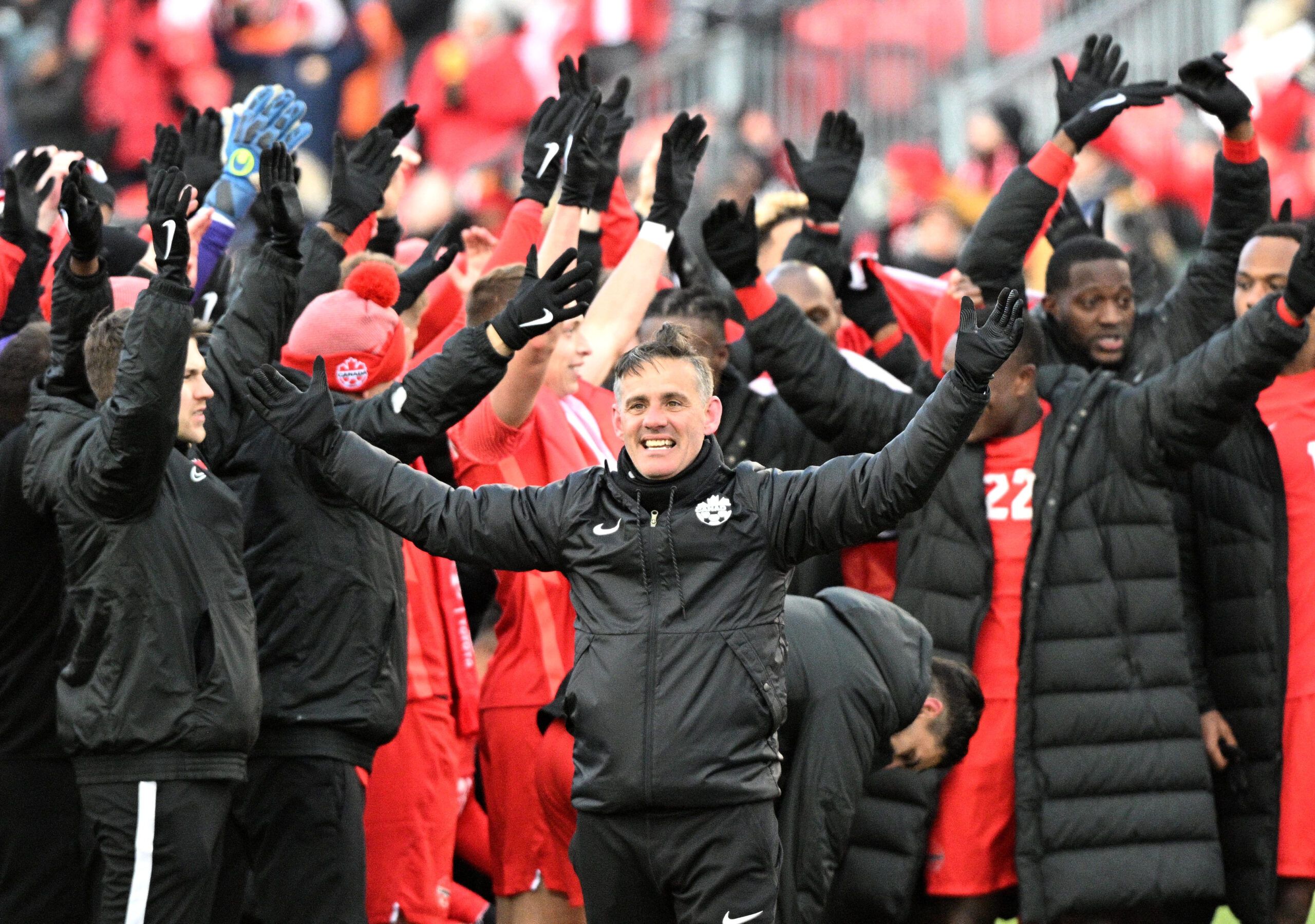 Mar 27, 2022; Toronto, Ontario, CAN;   Canada head coach John Herdman leads his players in the Viking Clap as they celebrate a win over Jamaica in a FIFA World Cup qualifying soccer match at BMO Field. Mandatory Credit: Dan Hamilton-USA TODAY Sports