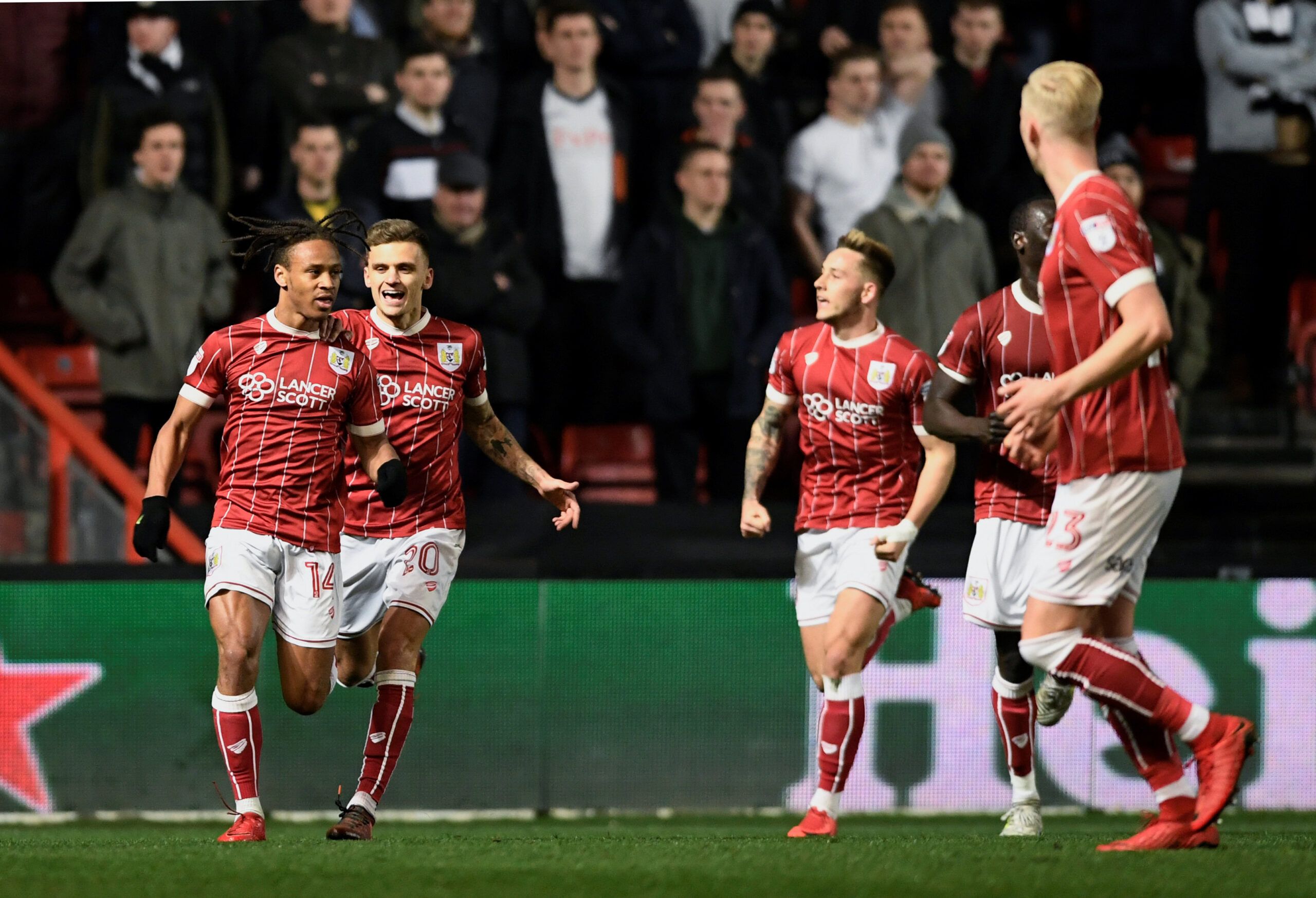 Soccer Football - Championship - Bristol City vs Fulham - Ashton Gate Stadium, Bristol, Britain - February 21, 2018  Bristol City's Bobby Reid celebrates their first goal with team mates   Action Images/Tony O'Brien  EDITORIAL USE ONLY. No use with unauthorized audio, video, data, fixture lists, club/league logos or 