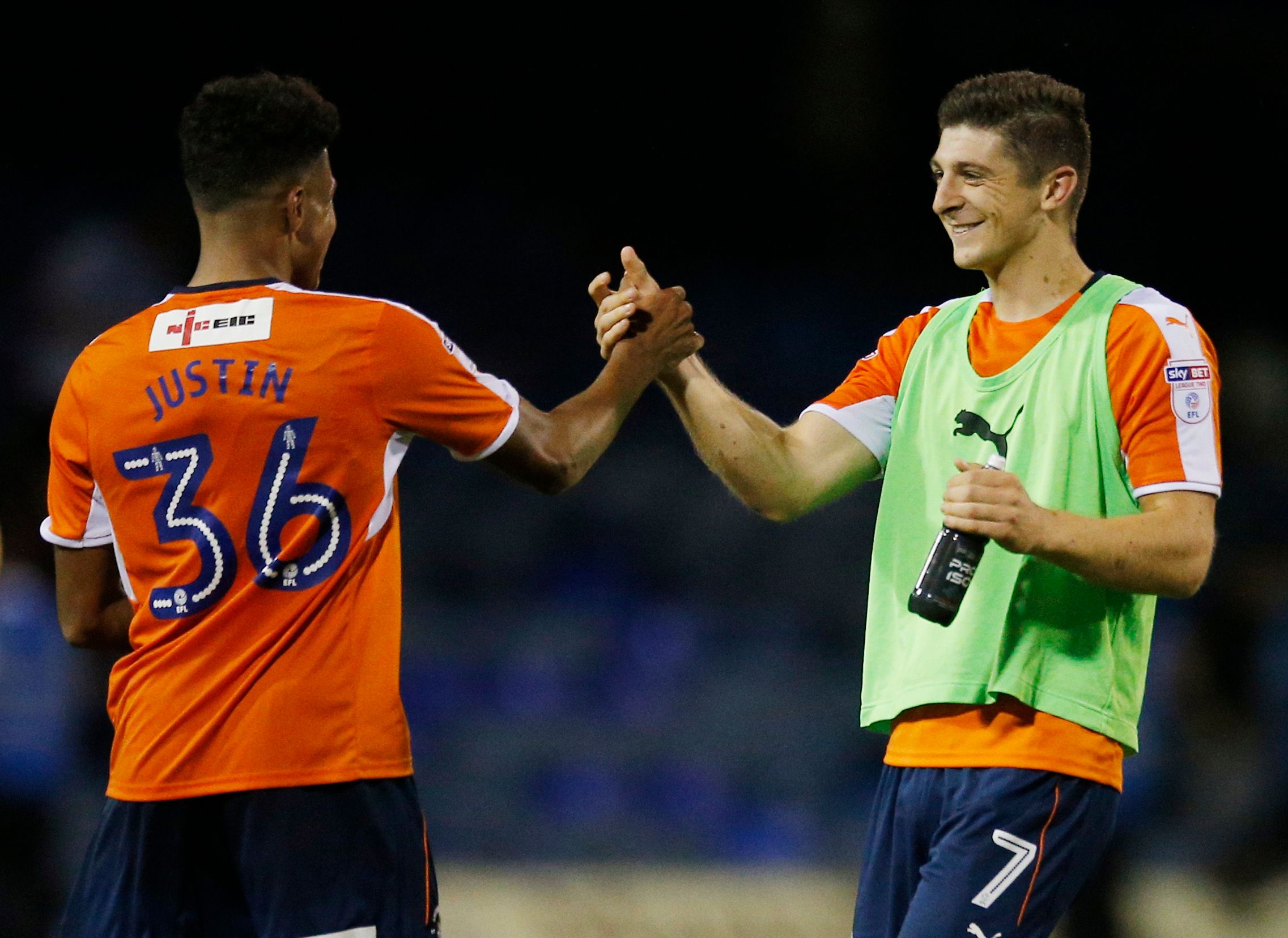 Britain Football Soccer - Luton Town v Aston Villa - EFL Cup First Round - Kenilworth Road - 10/8/16
Luton Town's Jake Gray and James Justin celebrate at the end of the match
Mandatory Credit: Action Images / Andrew Couldridge
Livepic