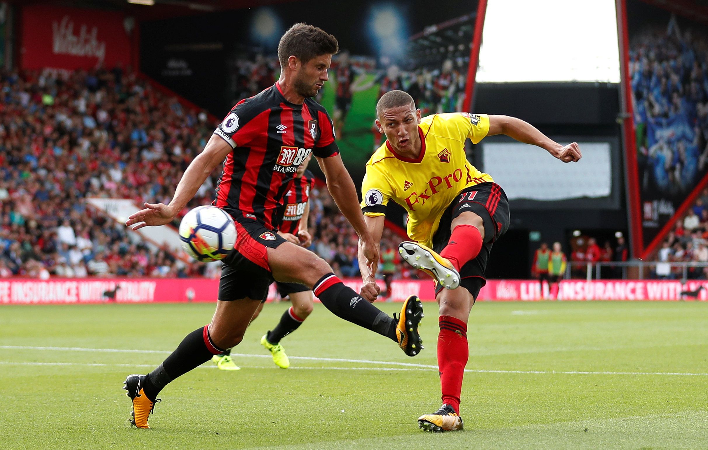 Football Soccer - Premier League - AFC Bournemouth vs Watford - Bournemouth, Britain - August 19, 2017   Watford's Richarlison in action with Bournemouth's Andrew Surman    Action Images via Reuters/Matthew Childs     EDITORIAL USE ONLY. No use with unauthorized audio, video, data, fixture lists, club/league logos or 