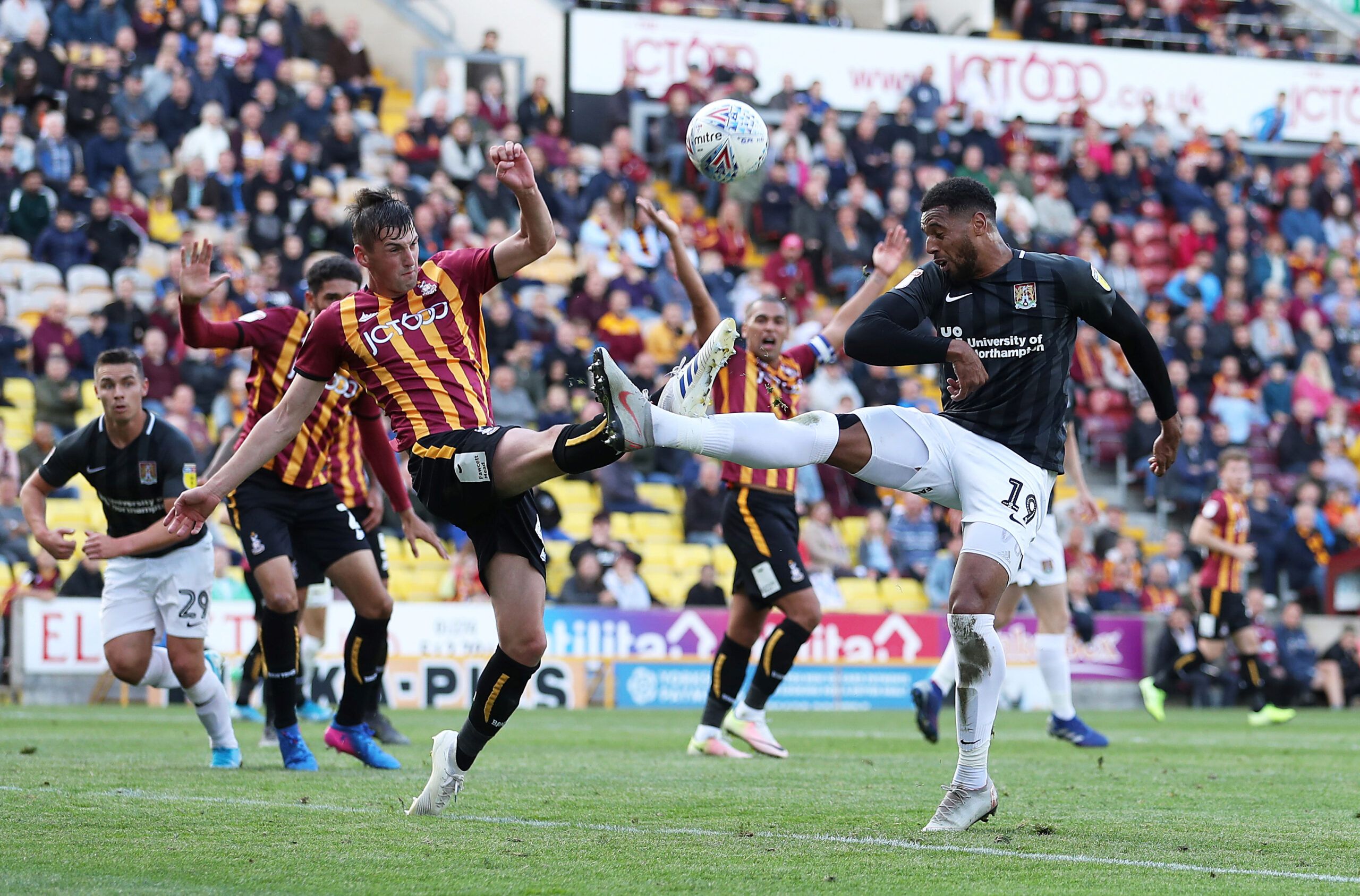 Soccer Football - League Two - Bradford City v Northampton Town - Northern Commercials Stadium, Bradford, Britain - September 7, 2019   Bradford City's Paudie O'Connor in action with Northampton Town's Vadaine Oliver   Action Images/John Clifton    EDITORIAL USE ONLY. No use with unauthorized audio, video, data, fixture lists, club/league logos or 