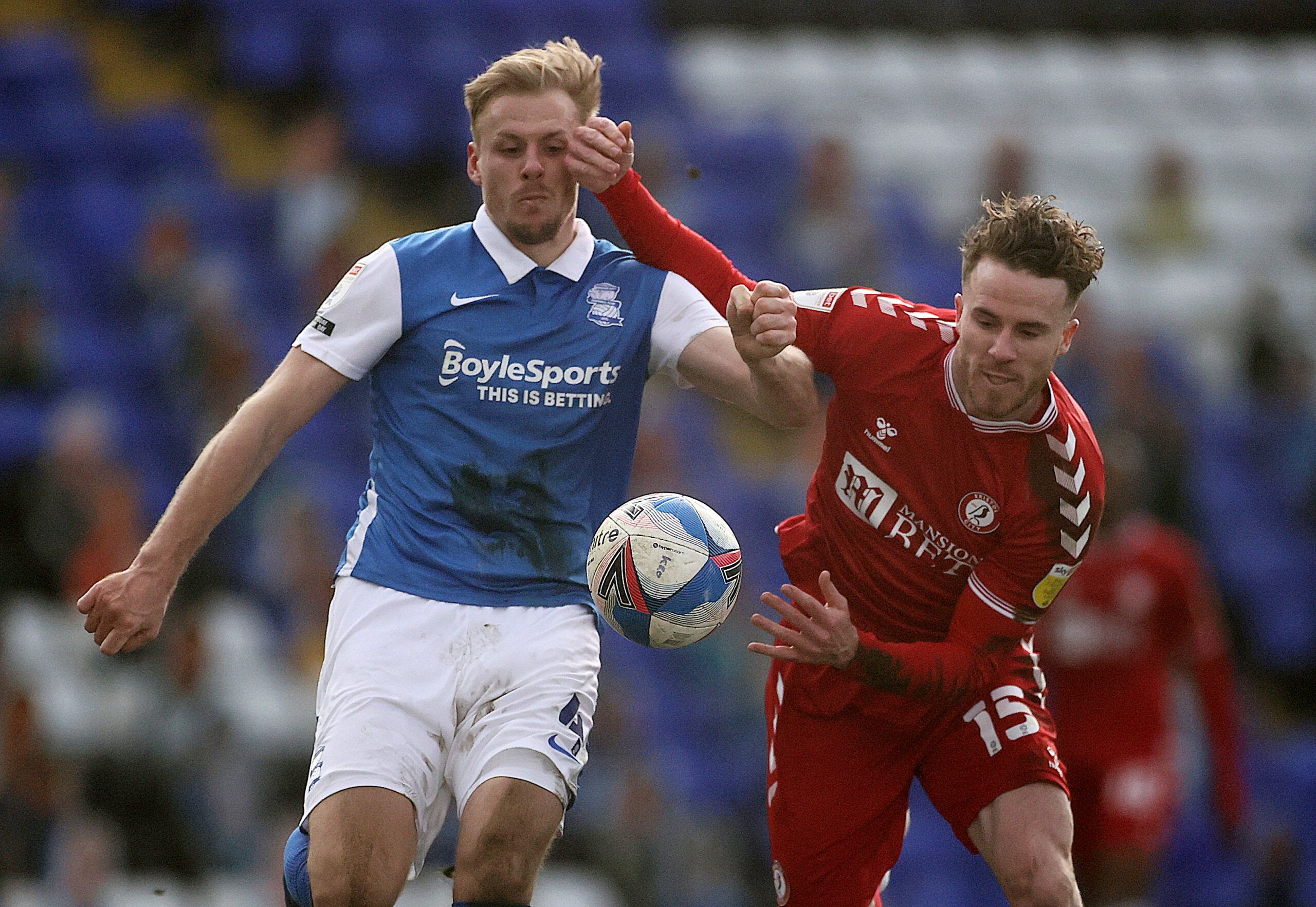 Soccer Football - Championship - Birmingham City v Bristol City - St Andrew's, Birmingham, Britain - March 13, 2021 Birmingham City's Marc Roberts in action with Bristol City's Marley Watkins Action Images/Carl Recine EDITORIAL USE ONLY. No use with unauthorized audio, video, data, fixture lists, club/league logos or 'live' services. Online in-match use limited to 75 images, no video emulation. No use in betting, games or single club /league/player publications.  Please contact your account repr