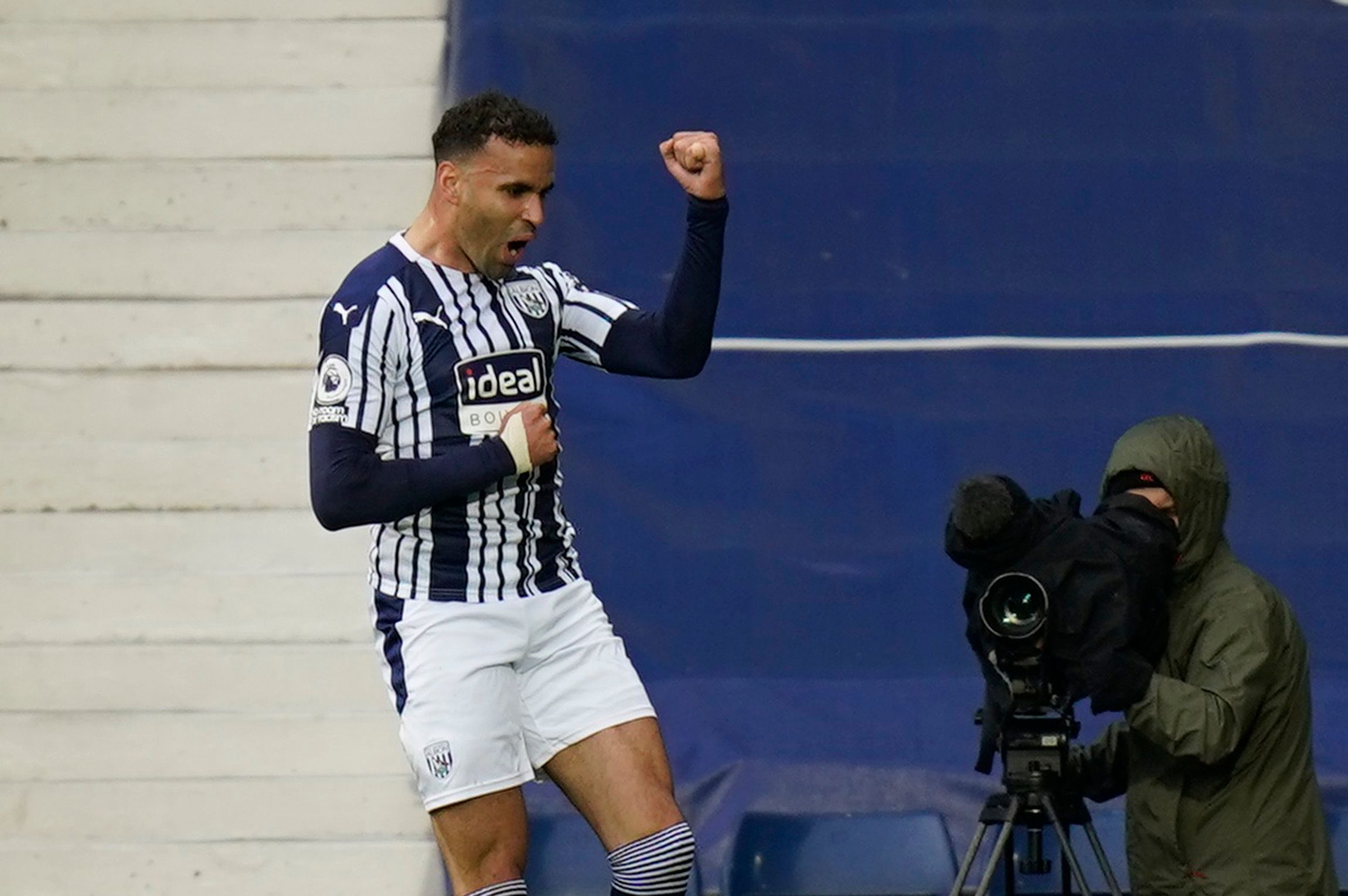 Soccer Football - Premier League - West Bromwich Albion v Liverpool - The Hawthorns, West Bromwich, Britain - May 16, 2021 West Bromwich Albion's Hal Robson-Kanu celebrates scoring their first goal Pool via REUTERS/Tim Keeton EDITORIAL USE ONLY. No use with unauthorized audio, video, data, fixture lists, club/league logos or 'live' services. Online in-match use limited to 75 images, no video emulation. No use in betting, games or single club /league/player publications.  Please contact your acco