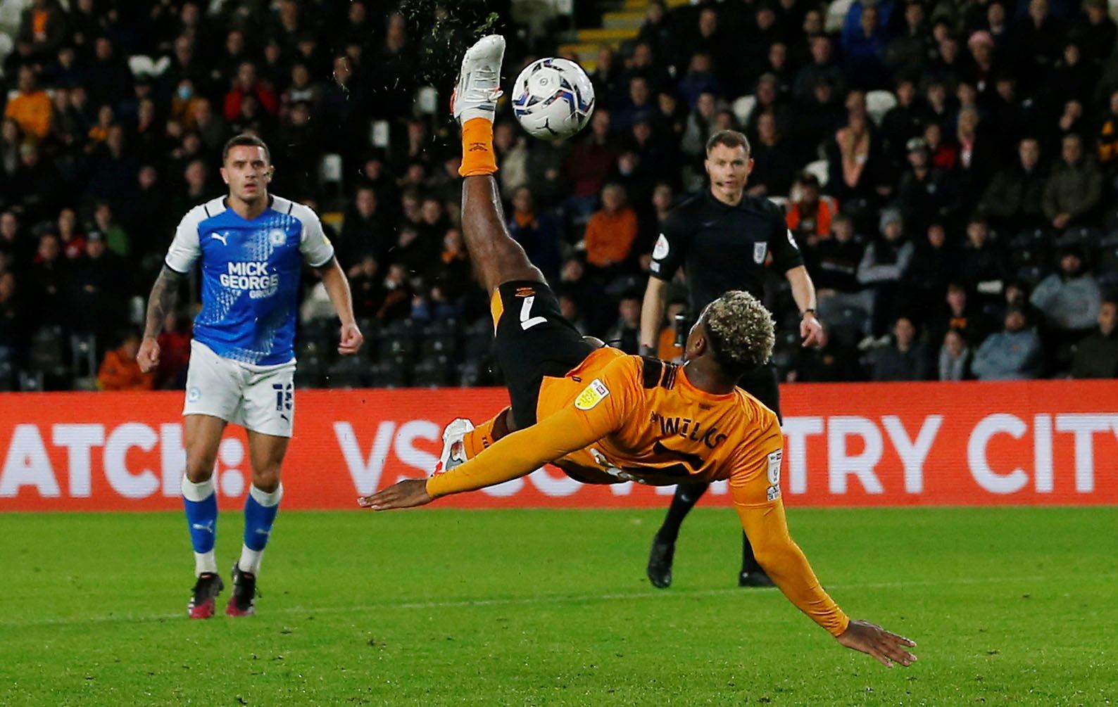 Soccer Football - Championship - Hull City v Peterborough United - KCOM Stadium, Hull, Britain - October 20, 2021  Hull City's Mallik Wilks has an attempt on goal  Action Images/Craig Brough  EDITORIAL USE ONLY. No use with unauthorized audio, video, data, fixture lists, club/league logos or 