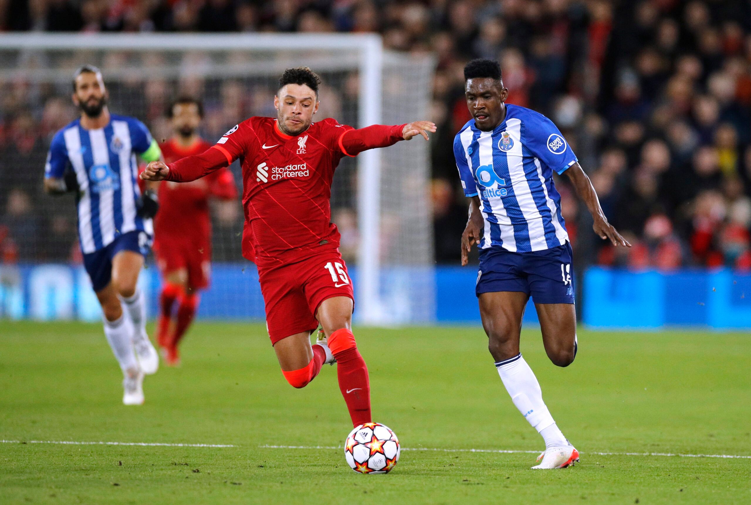 Soccer Football - Champions League - Group B - Liverpool v FC Porto - Anfield, Liverpool, Britain - November 24, 2021 Liverpool's Alex Oxlade-Chamberlain in action with FC Porto's Zaidu Sanusi REUTERS/Phil Noble