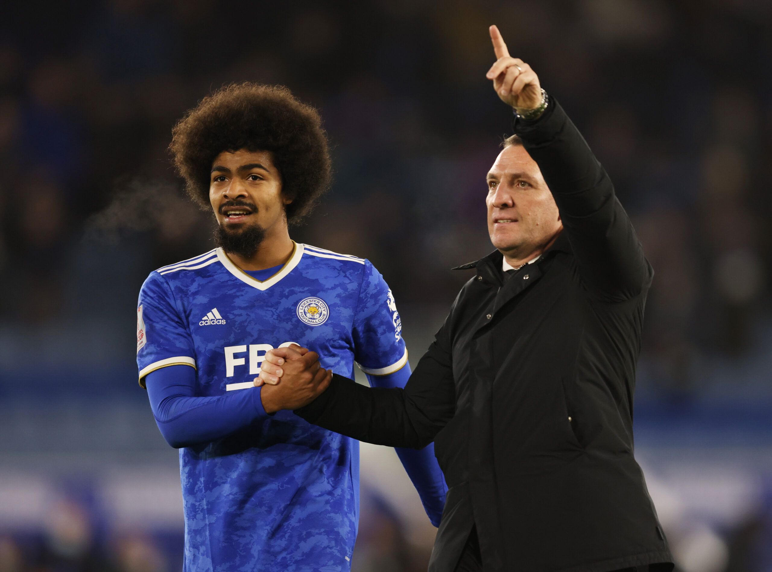 Soccer Football - FA Cup Third Round - Leicester City v Watford - King Power Stadium, Leicester, Britain - January 8, 2022 Leicester City manager Brendan Rodgers and Hamza Choudhury acknowledge the fans after the match Action Images via Reuters/John Clifton