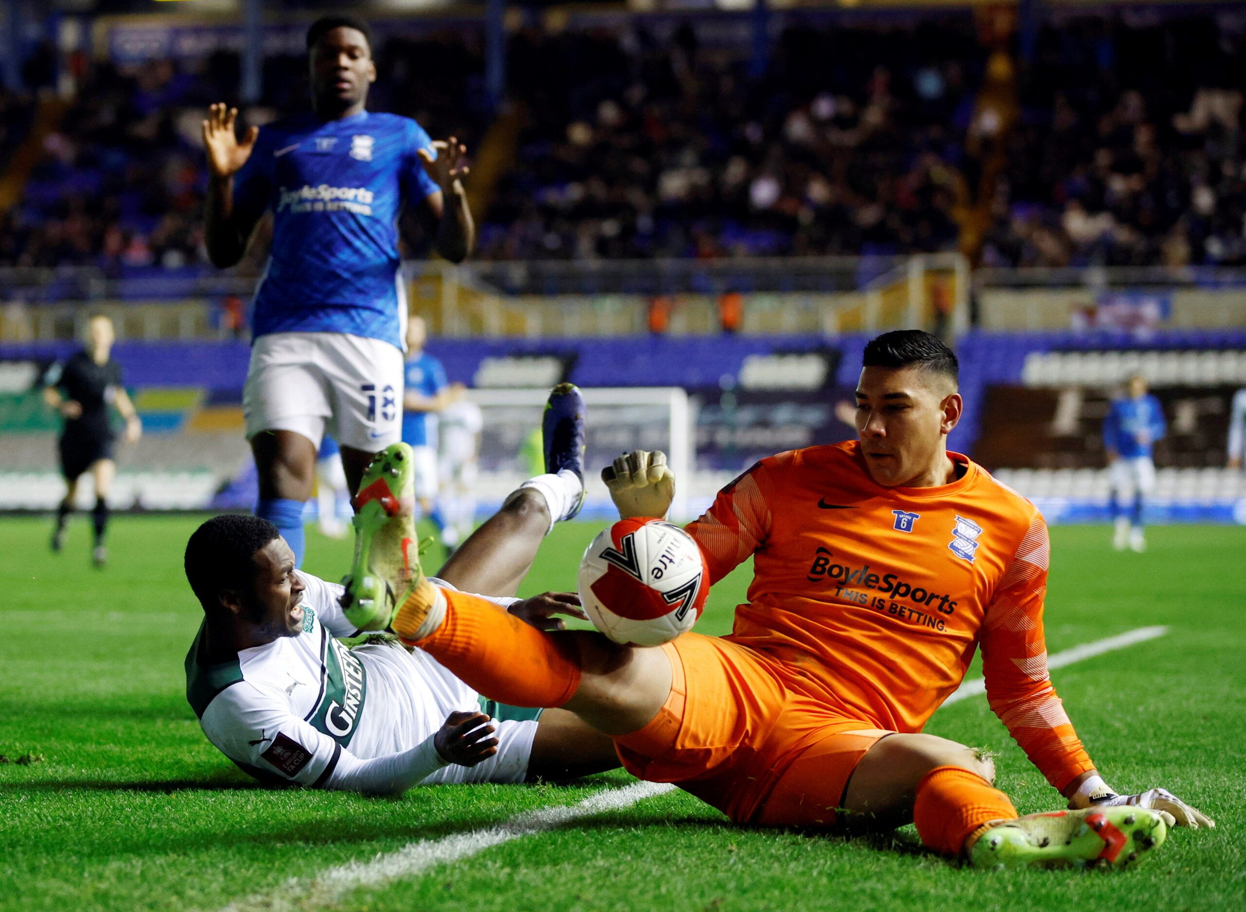 Soccer Football - FA Cup Third Round - Birmingham City v Plymouth Argyle - St Andrew's, Birmingham, Britain - January 8, 2022 Birmingham City?s Neil Etheridge in action with Plymouth Argyle's Jordon Garrick  Action Images/John Sibley