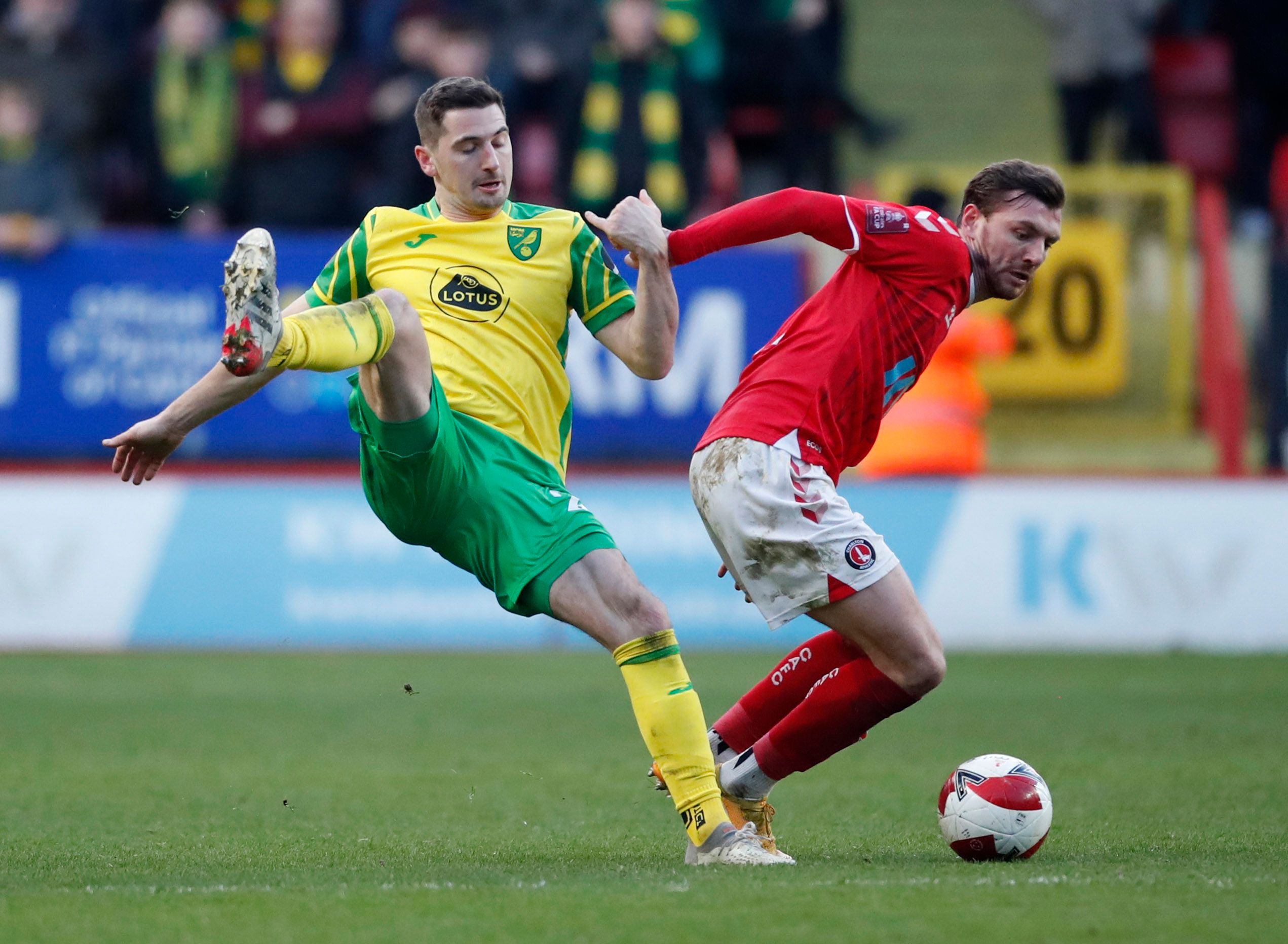 Soccer Football - FA Cup Third Round - Charlton Athletic v Norwich City - The Valley, London, Britain - January 9, 2022 Charlton Athletic's Alex Gilbey in action with Norwich City's Kenny McLean Action Images via Reuters/Peter Cziborra