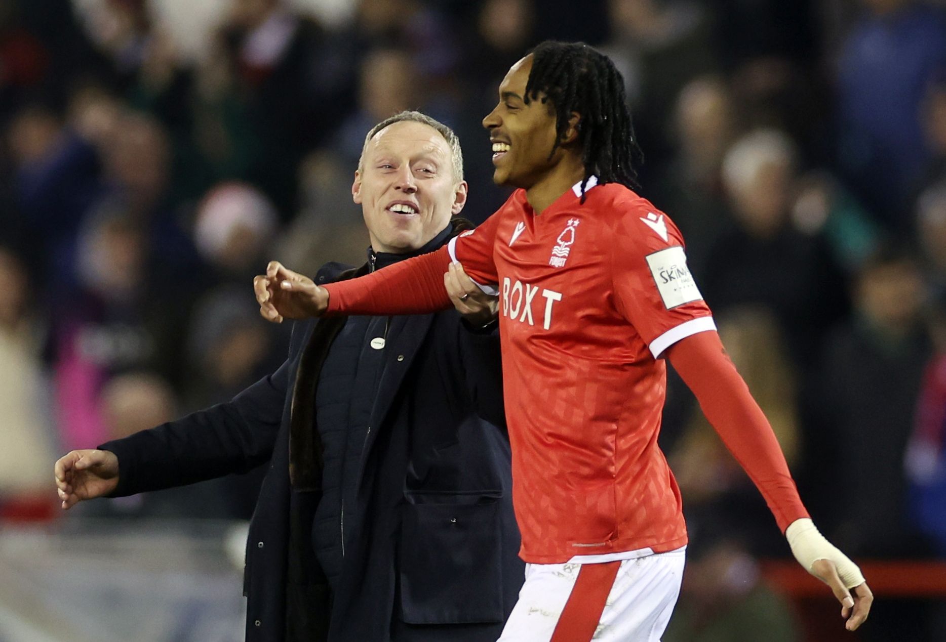 Soccer Football - FA Cup Fifth Round - Nottingham Forest v Huddersfield Town - The City Ground, Nottingham, Britain - March 7, 2022 Nottingham Forest manager Steve Cooper and Djed Spence celebrate after the match Action Images via Reuters/Paul Childs