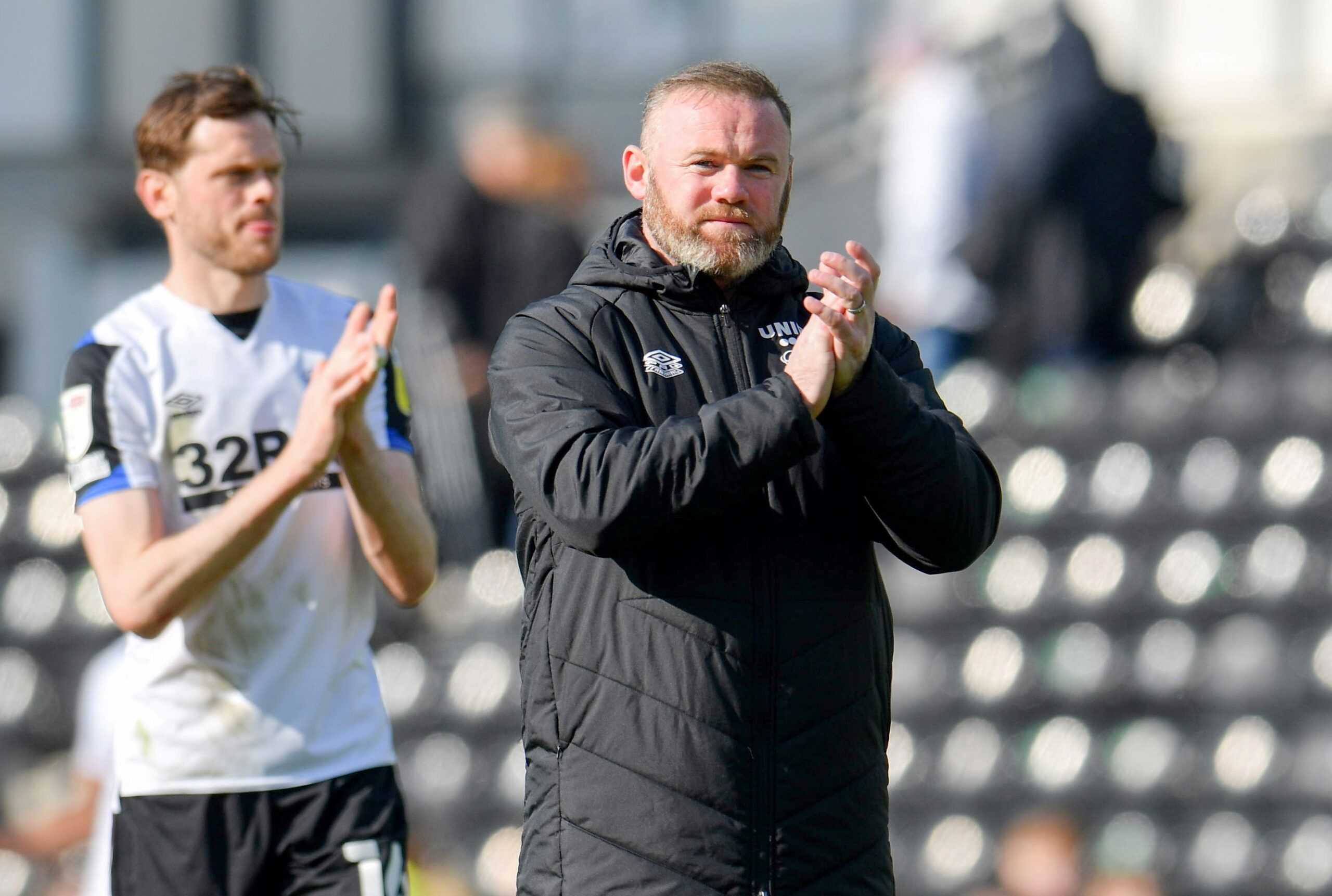 Soccer Football - Championship - Derby County v Bristol City - Pride Park, Derby, Britain - April 23, 2022 Derby County manager Wayne Rooney applauds fans after the match  Action Images/Paul Burrows  EDITORIAL USE ONLY. No use with unauthorized audio, video, data, fixture lists, club/league logos or 