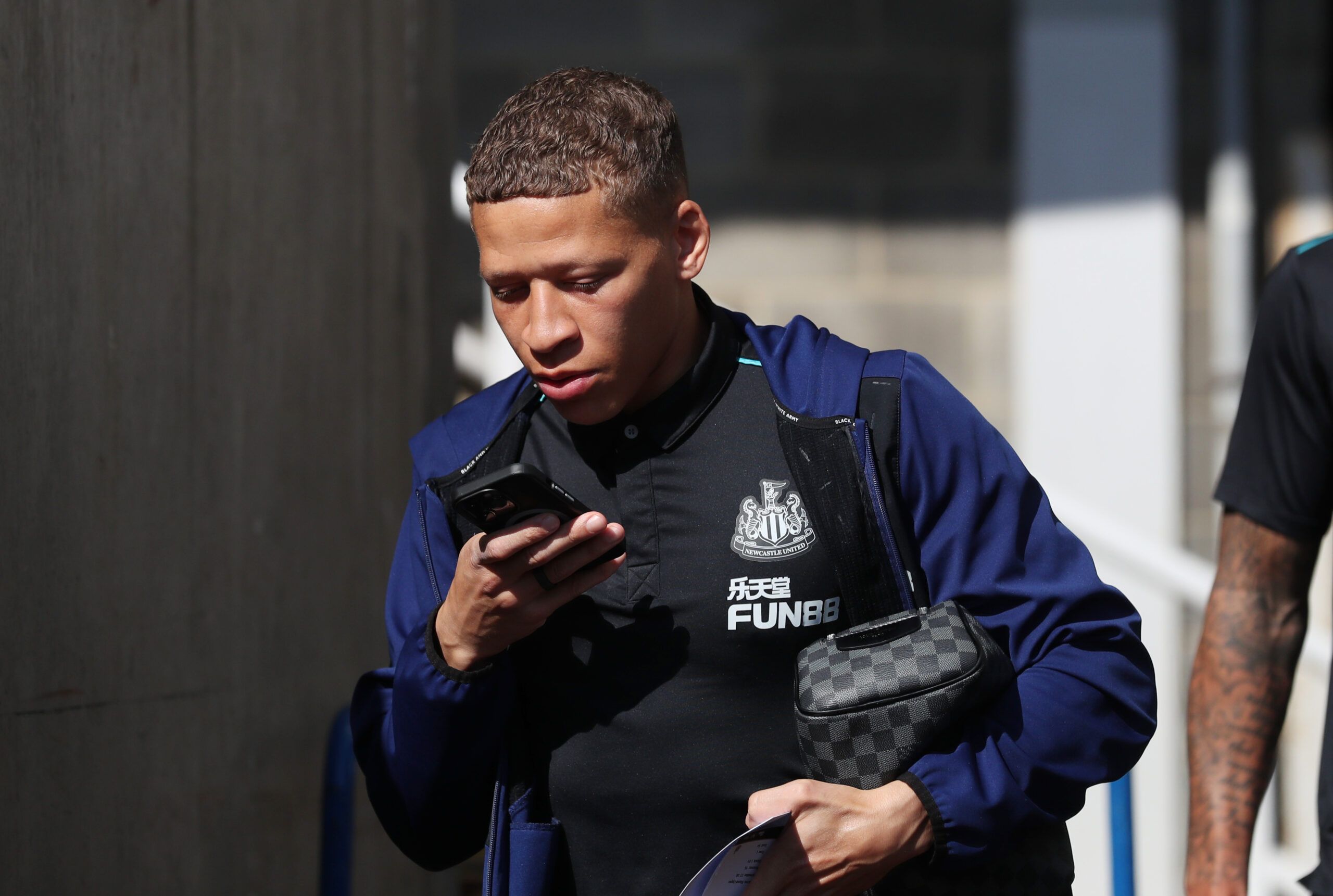 Soccer Football - Premier League - Newcastle United v Liverpool - St James' Park, Newcastle, Britain - April 30, 2022 Newcastle United's Dwight Gayle arrives at the stadium before the match REUTERS/Scott Heppell EDITORIAL USE ONLY. No use with unauthorized audio, video, data, fixture lists, club/league logos or 'live' services. Online in-match use limited to 75 images, no video emulation. No use in betting, games or single club /league/player publications.  Please contact your account representa