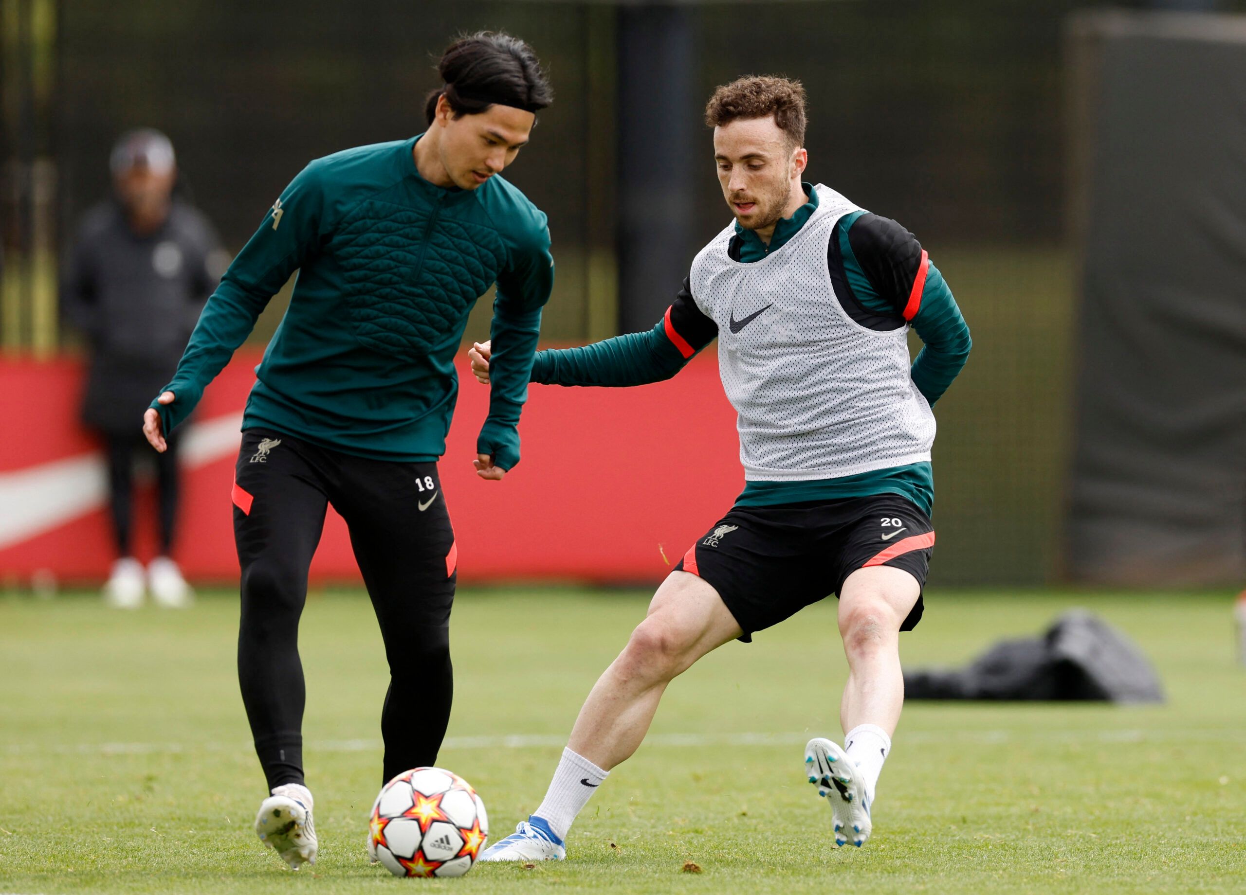 Soccer Football - Champions League - Final - Liverpool Media Day - AXA Training Centre, Liverpool, Britain - May 25, 2022 Liverpool's Takumi Minamino and Diogo Jota during training Action Images via Reuters/Jason Cairnduff