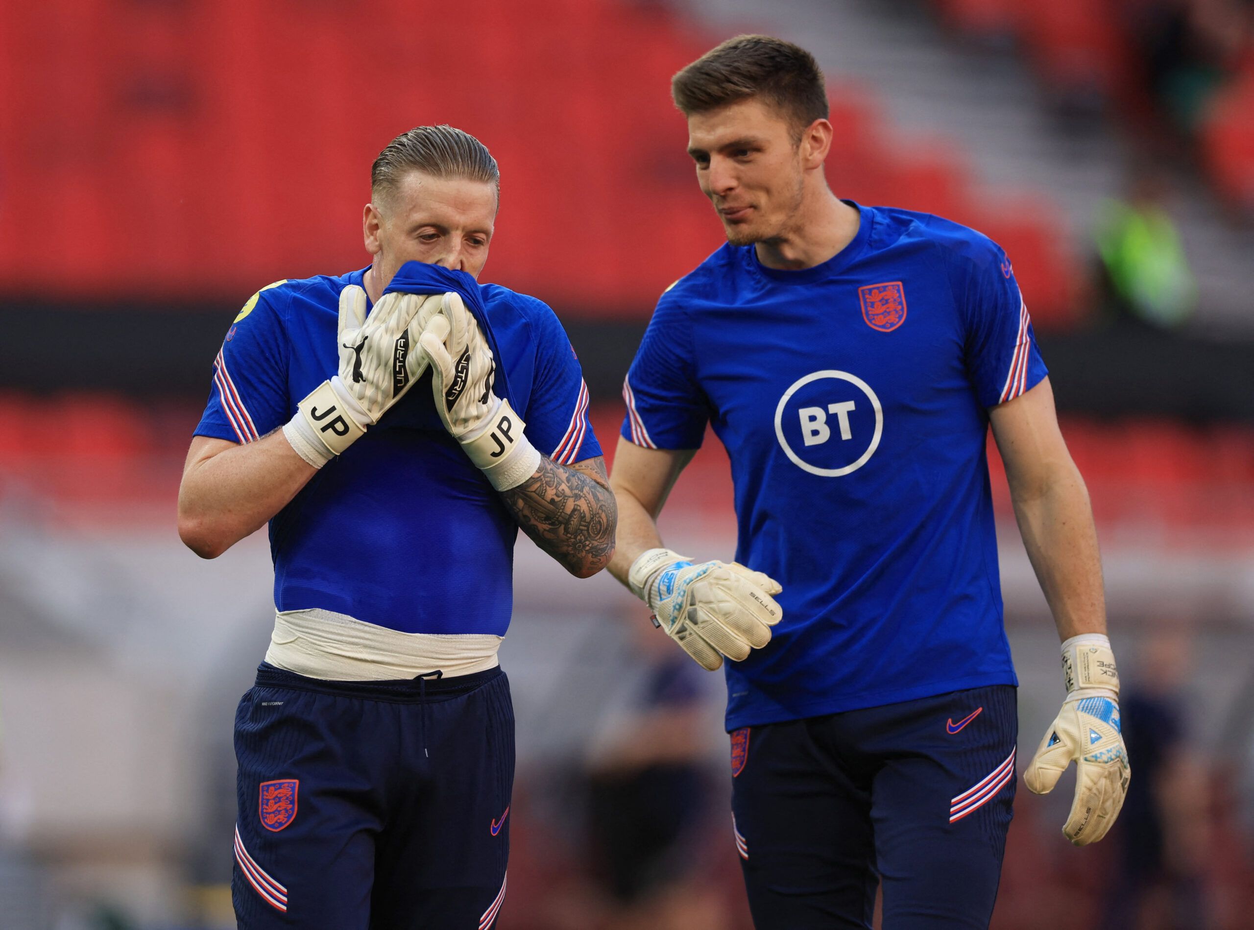 Soccer Football - UEFA Nations League - Group C - Hungary v England - Puskas Arena Park, Budapest, Hungary - June 4, 2022 England's Jordan Pickford and Nick Pope during the warm up before the match Action Images via Reuters/Lee Smith