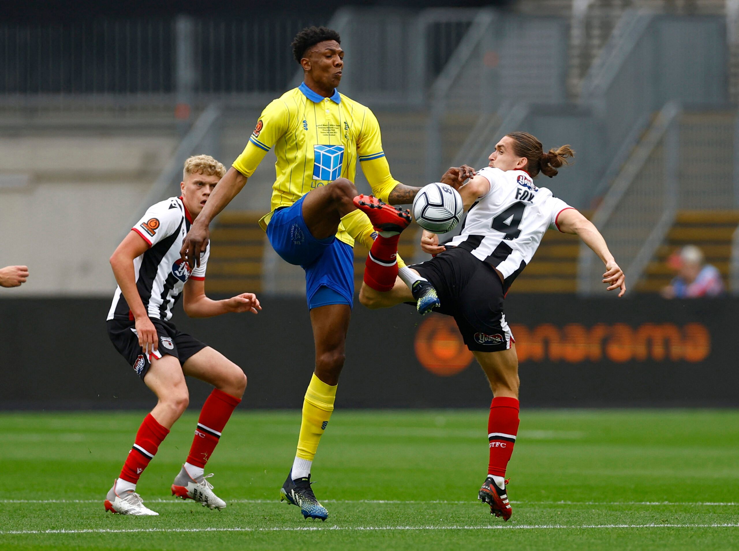Soccer Football - National League - Promotion Final - Solihull Moors v Grimsby Town - London Stadium, London, Britain - June 5, 2022 Solihull Moors' Kyle Hudlin in action with Grimsby Town's Ben Fox Action Images/Andrew Boyers EDITORIAL USE ONLY. No use with unauthorized audio, video, data, fixture lists, club/league logos or 'live' services. Online in-match use limited to 75 images, no video emulation. No use in betting, games or single club /league/player publications.  Please contact your acc